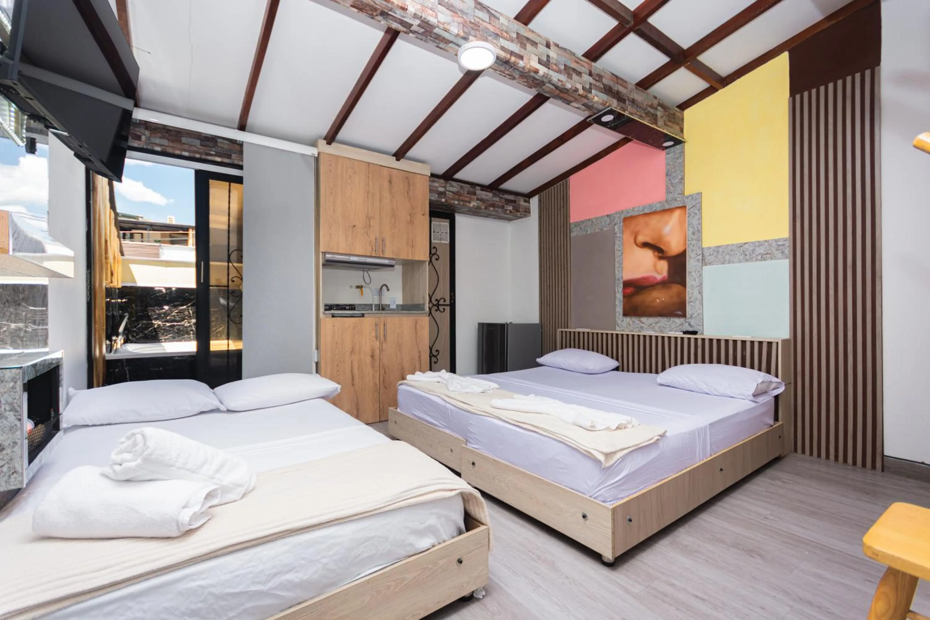 TV and multimedia, Bed in Hotel Lares 70 Laureles