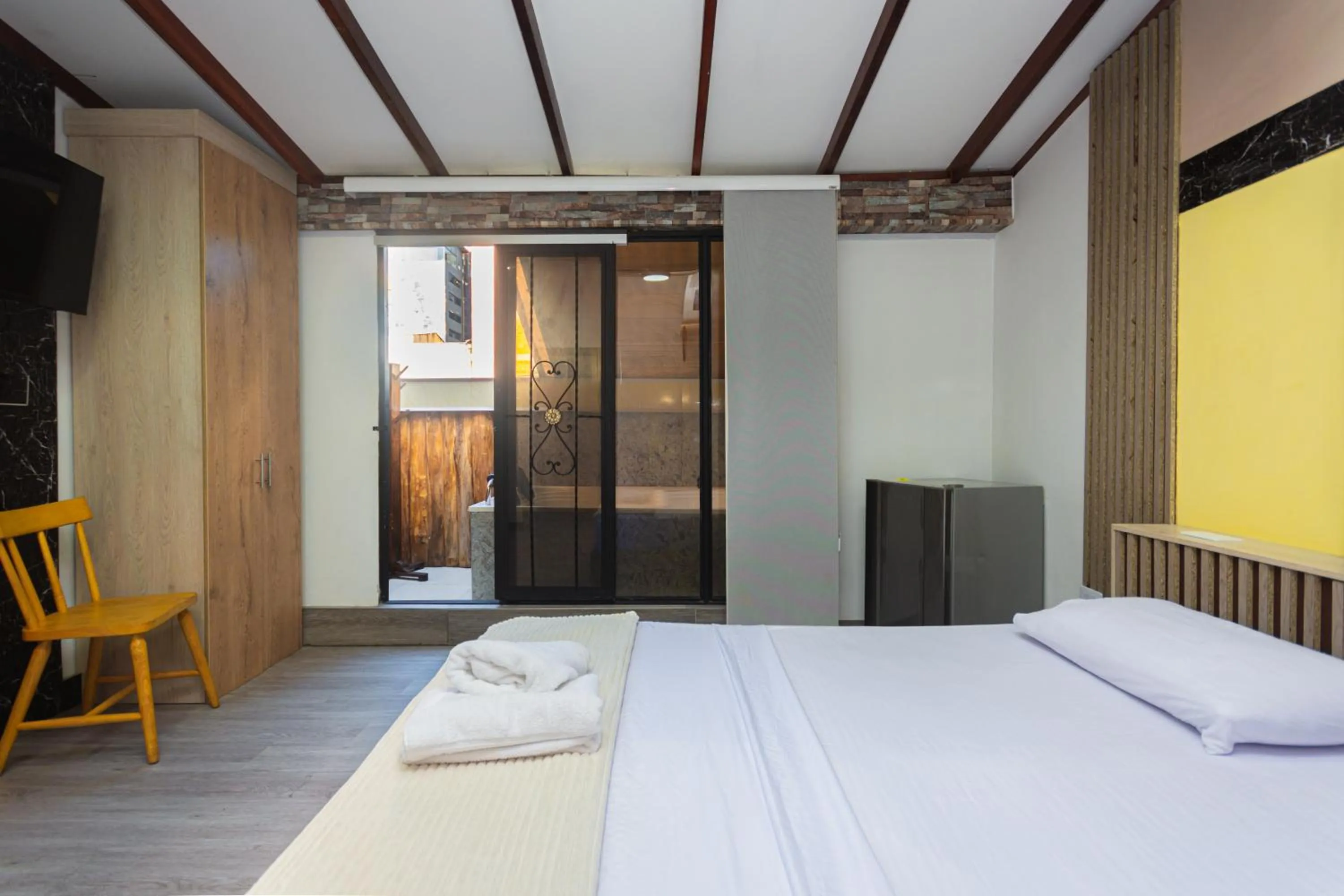 Bedroom, Bed in Hotel Lares 70 Laureles