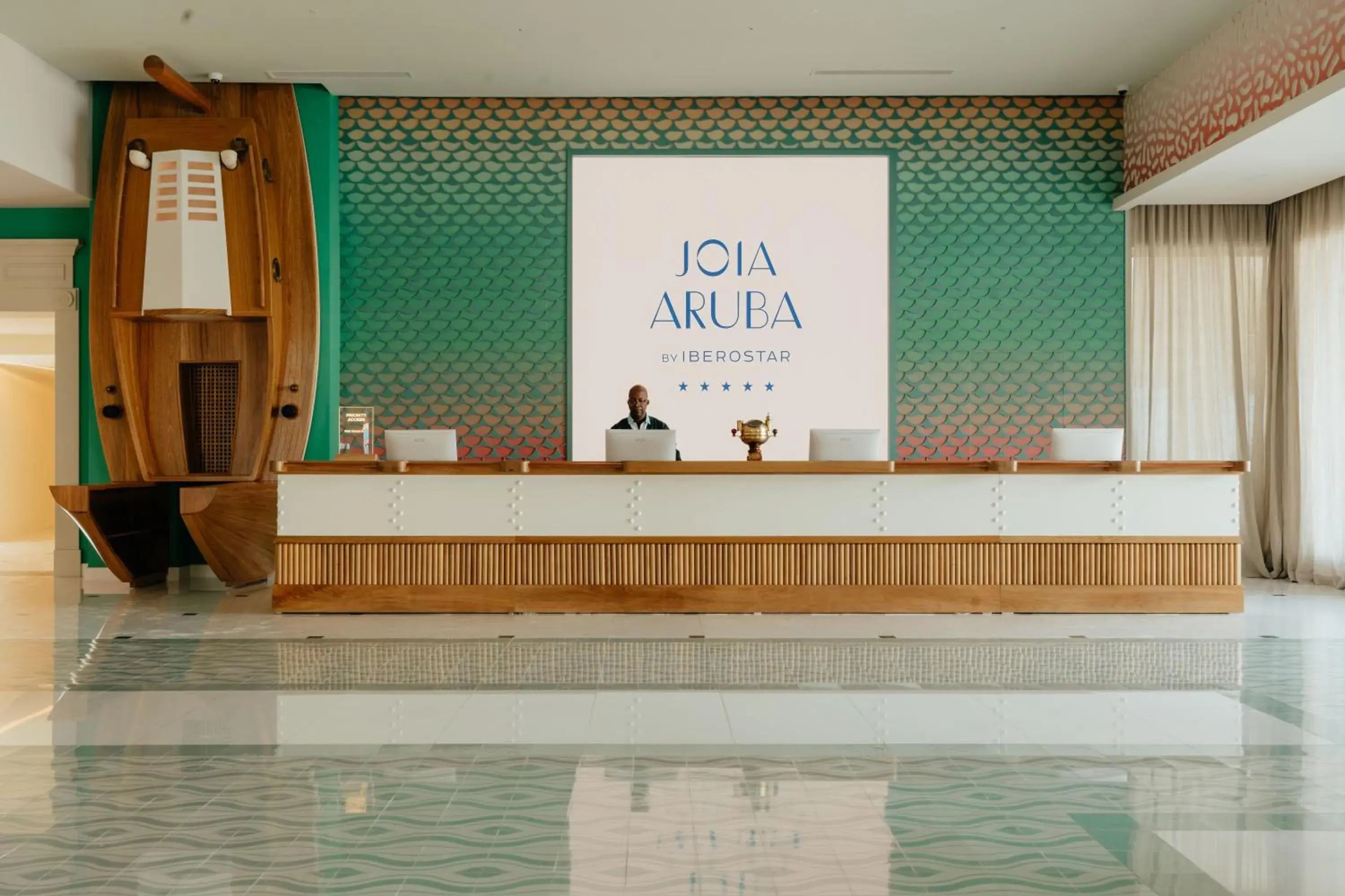 Lobby or reception in JOIA Aruba by Iberostar Lobby or reception in JOIA Aruba by Iberostar