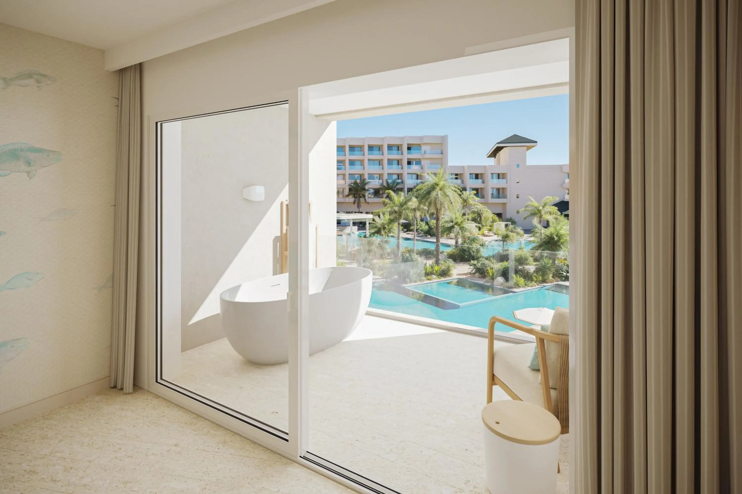 Bedroom in JOIA Aruba by Iberostar