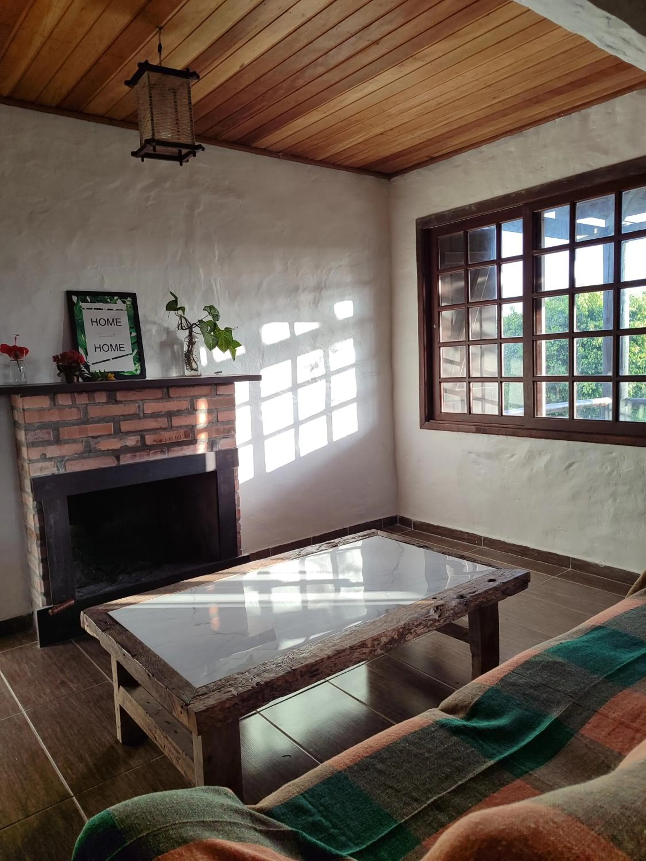 Living room in Pousada Casa Morango - Praia do Rosa - SC