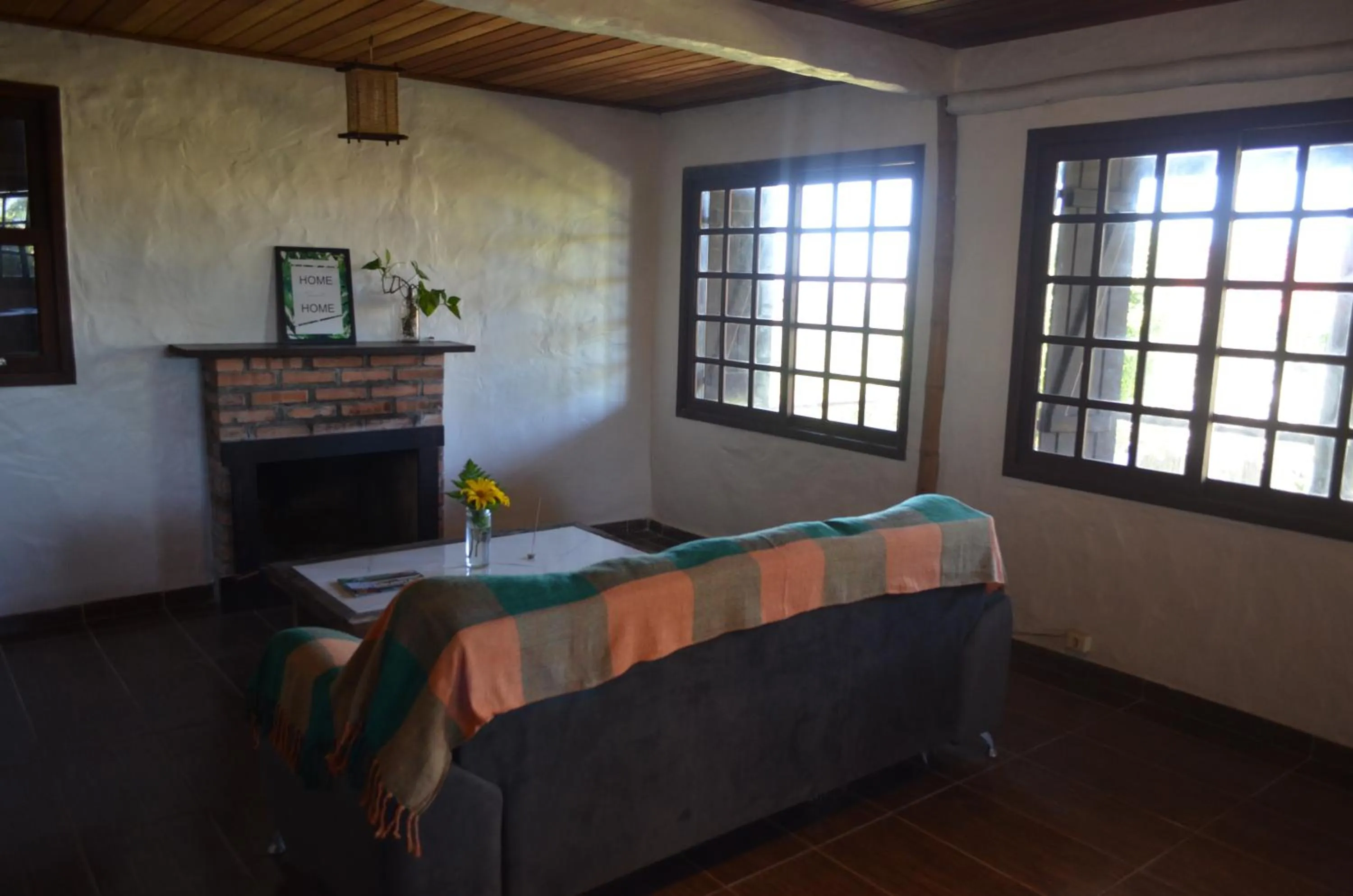 Living room in Pousada Casa Morango - Praia do Rosa - SC