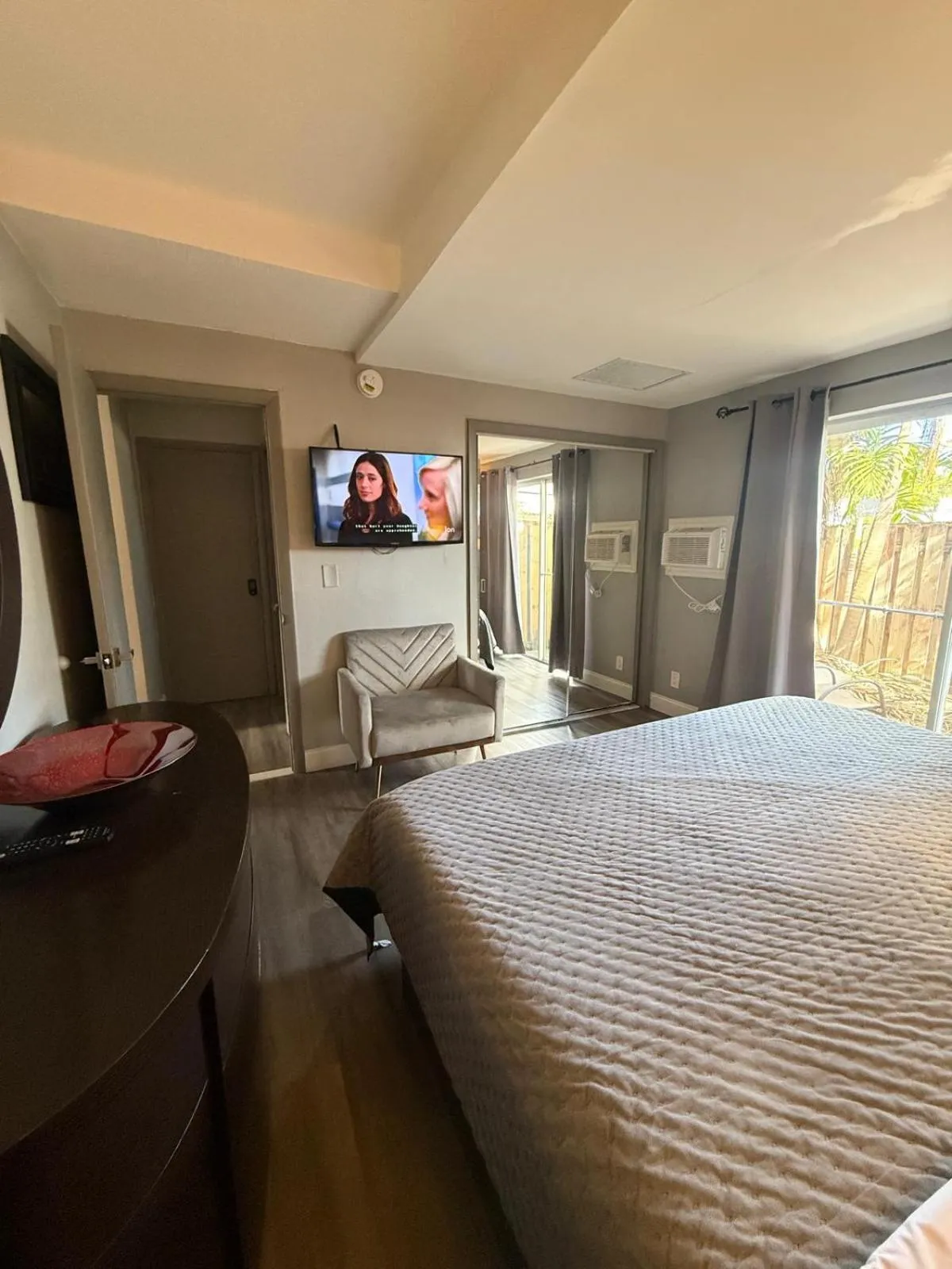 Bed in Sheridan Suites Apartments