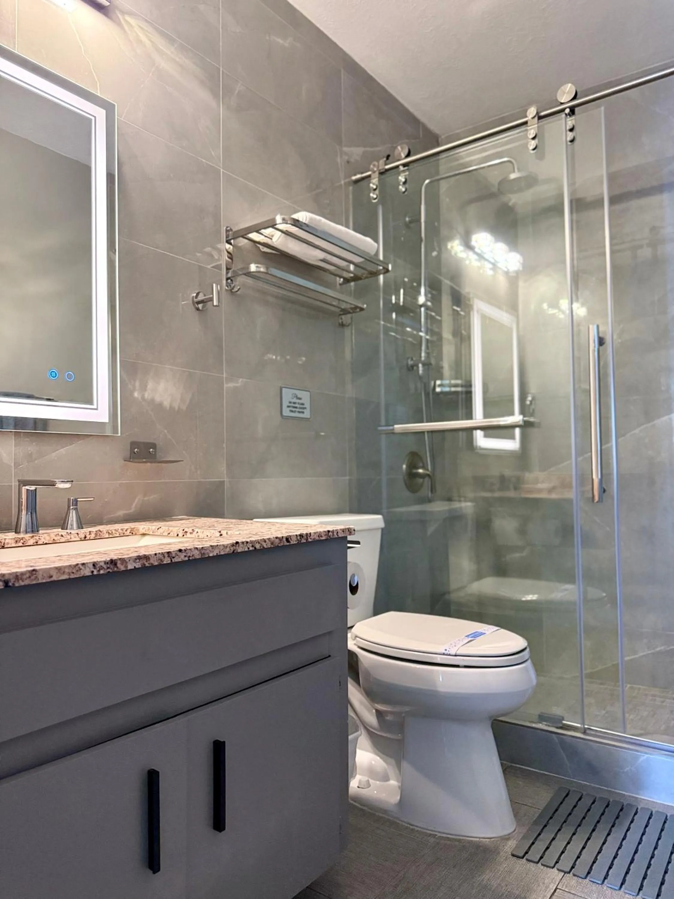 Shower in Sheridan Suites Apartments