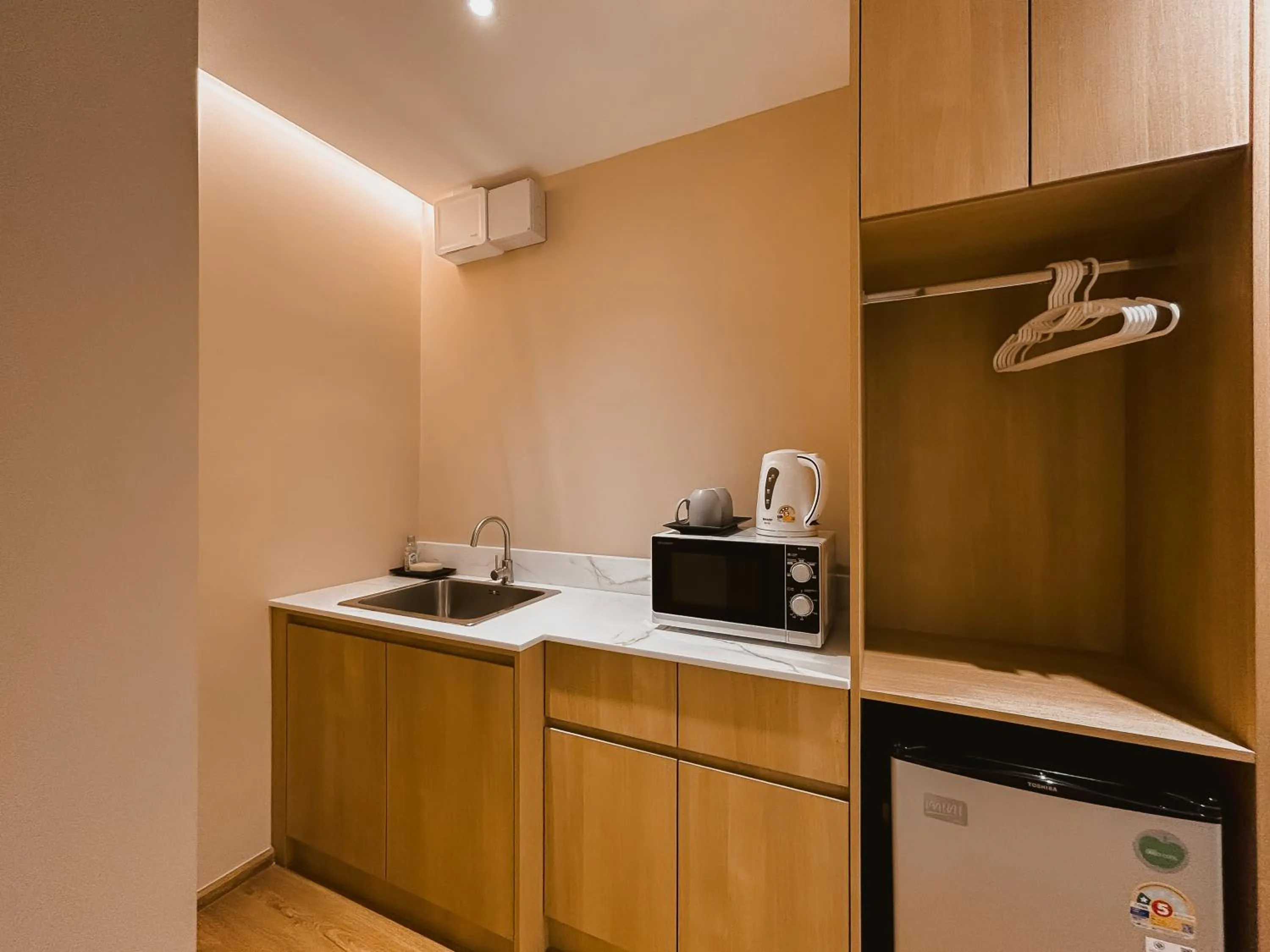 Kitchen or kitchenette in P.K. Garden Home