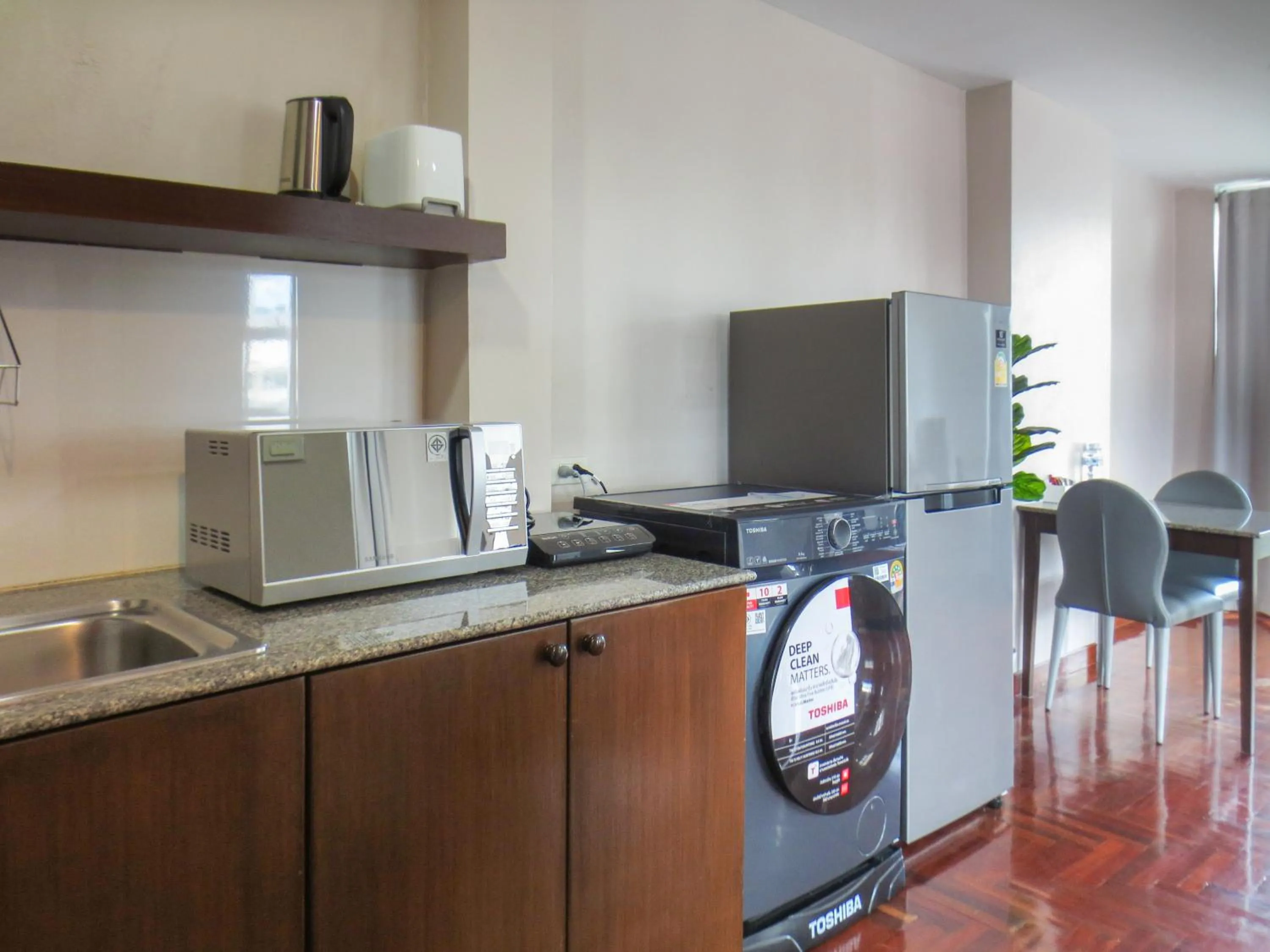 Kitchen or kitchenette in P.K. Garden Home