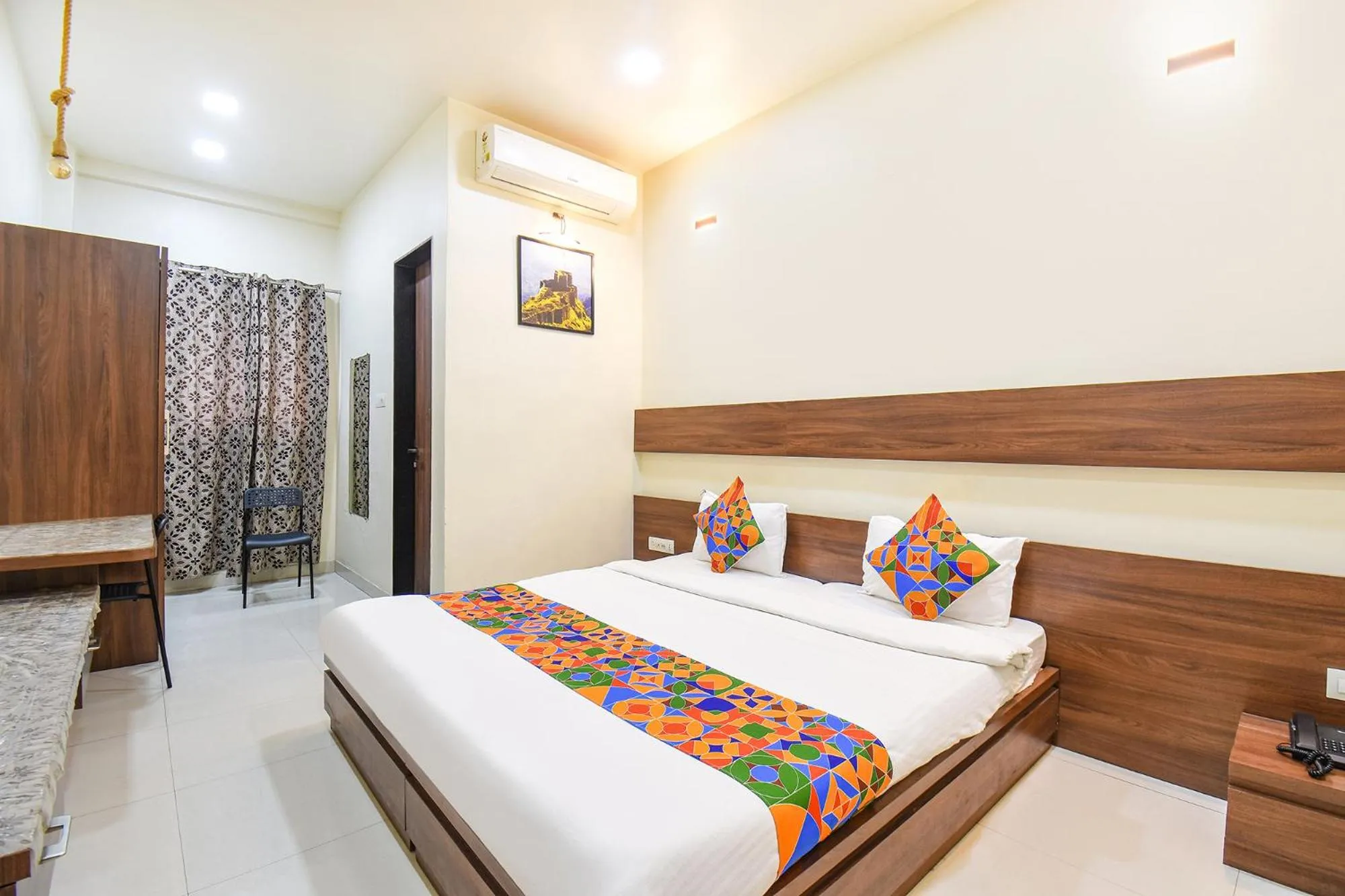 Bed in FabHotel Royal Suits - Nr Mahadji Shinde Chhatri