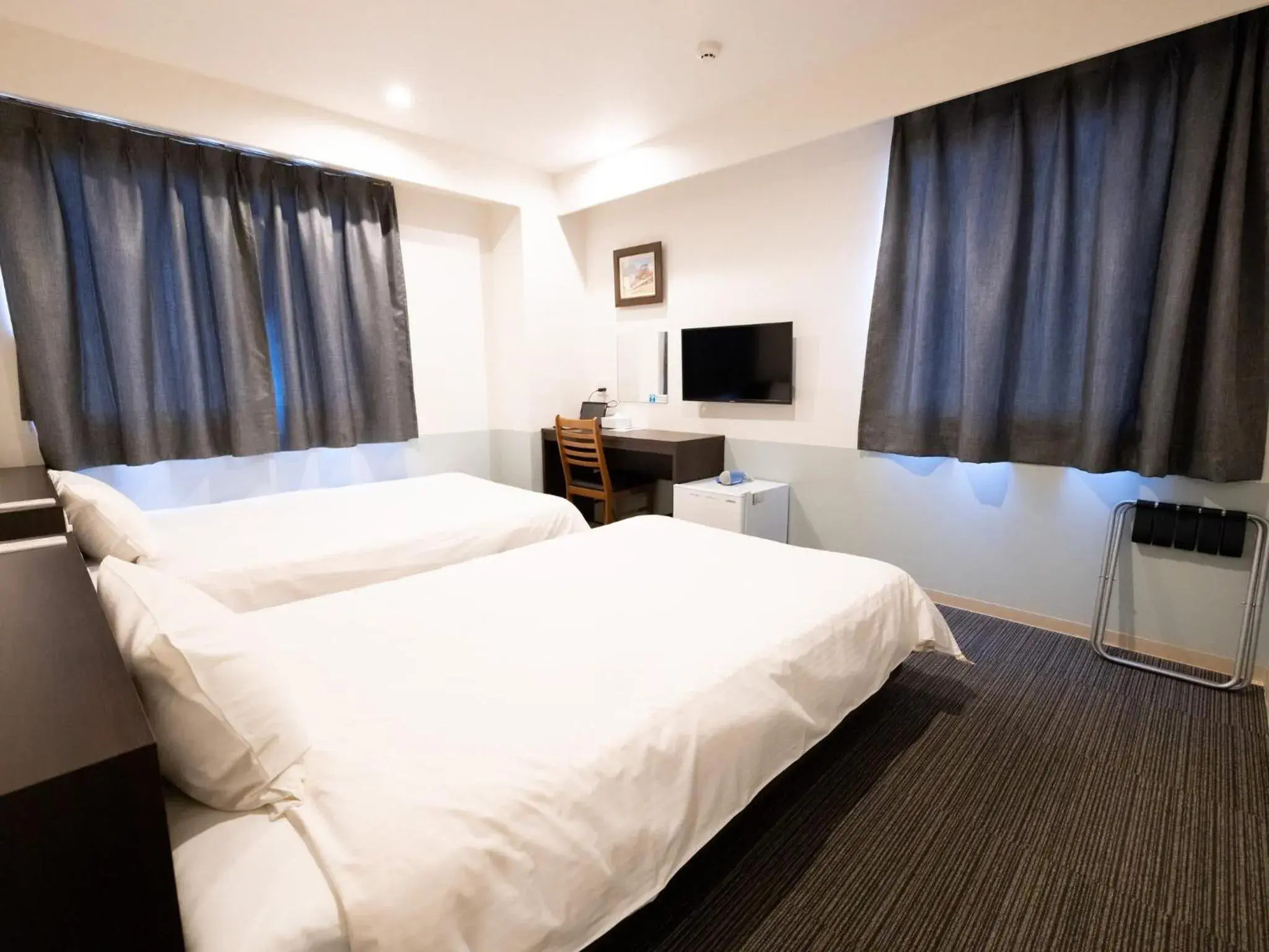 Bed in Hotel Taiyo Noen Tokushima Kenchomae Bed in Hotel Taiyo Noen Tokushima Kenchomae