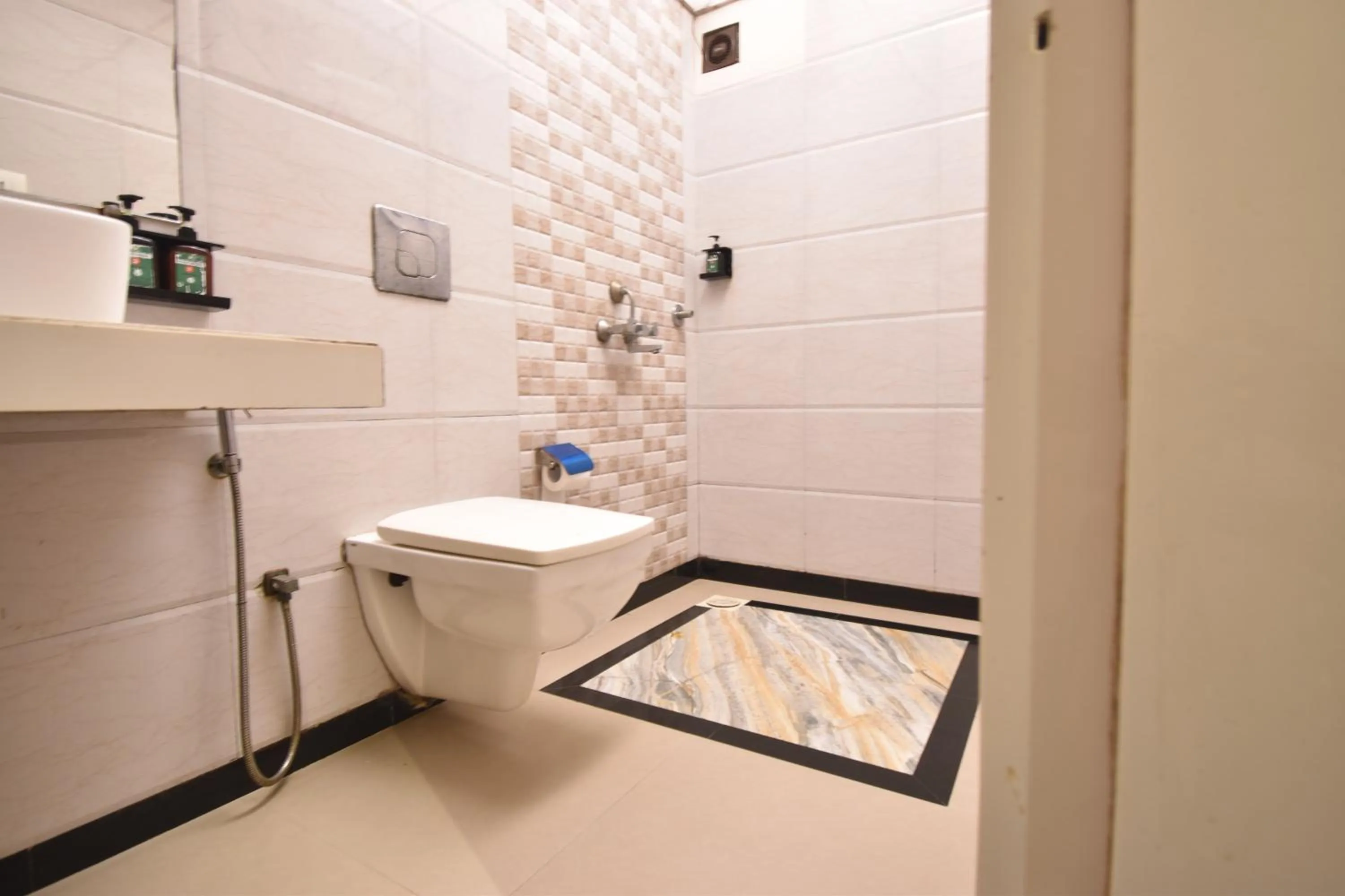 Bathroom in The Aarya A Smart Business Hotel