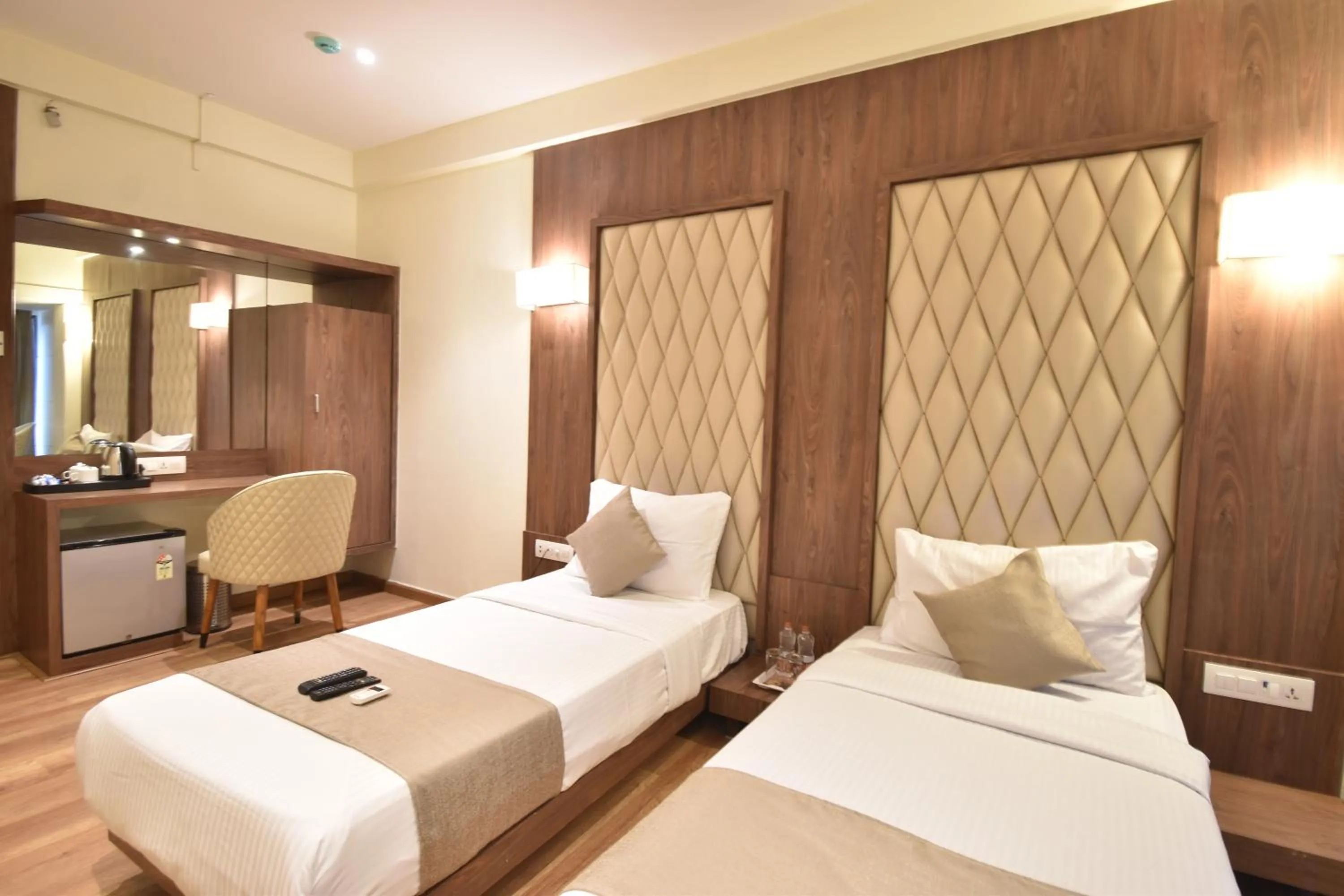 wardrobe, Bed in The Aarya A Smart Business Hotel