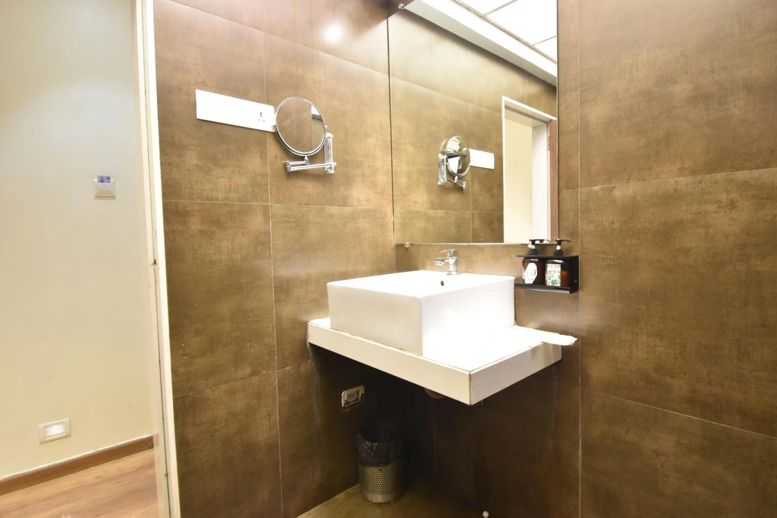 Bathroom in The Aarya A Smart Business Hotel