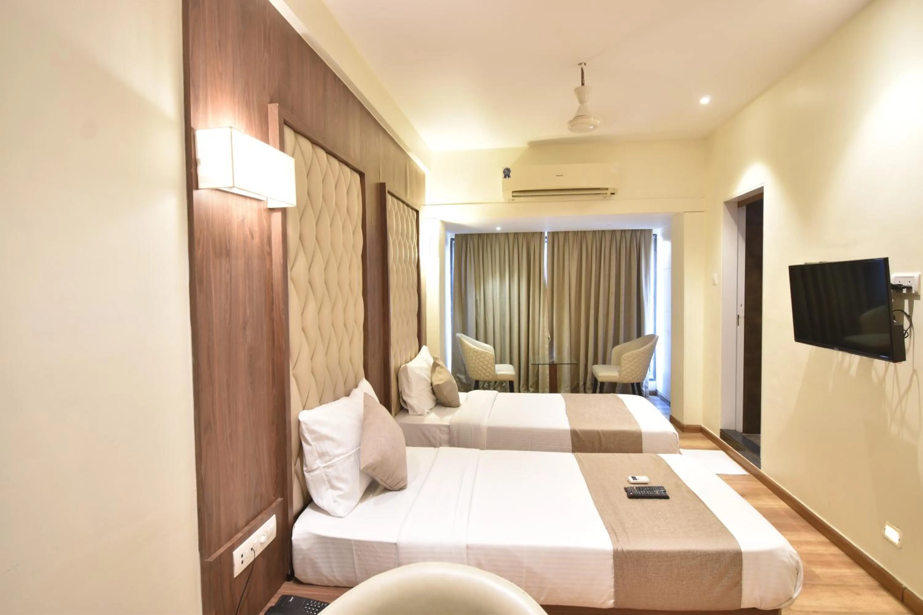 Photo of the whole room, Bed in The Aarya A Smart Business Hotel