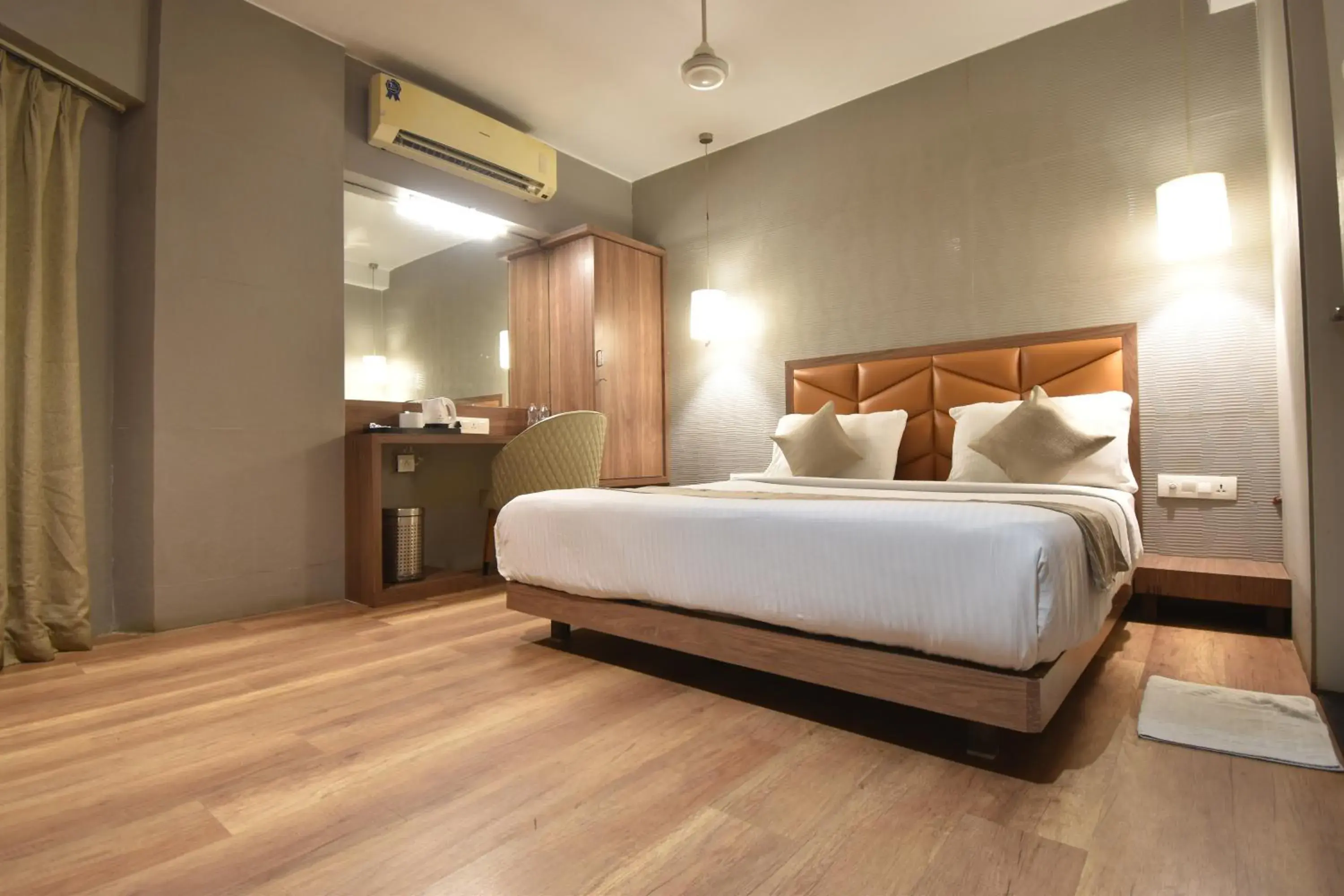 Bed in The Aarya A Smart Business Hotel Bed in The Aarya A Smart Business Hotel