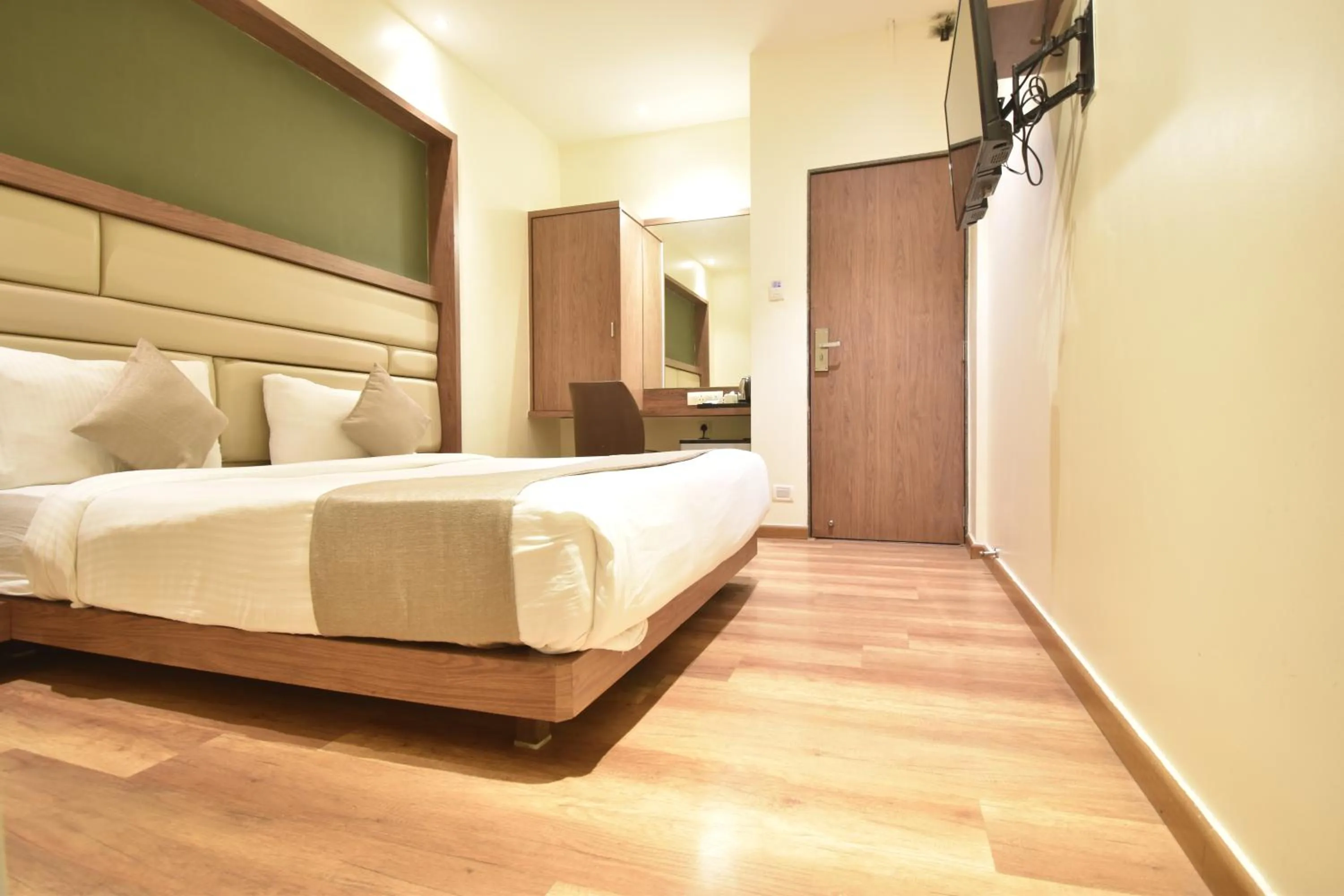Photo of the whole room, Bed in The Aarya A Smart Business Hotel