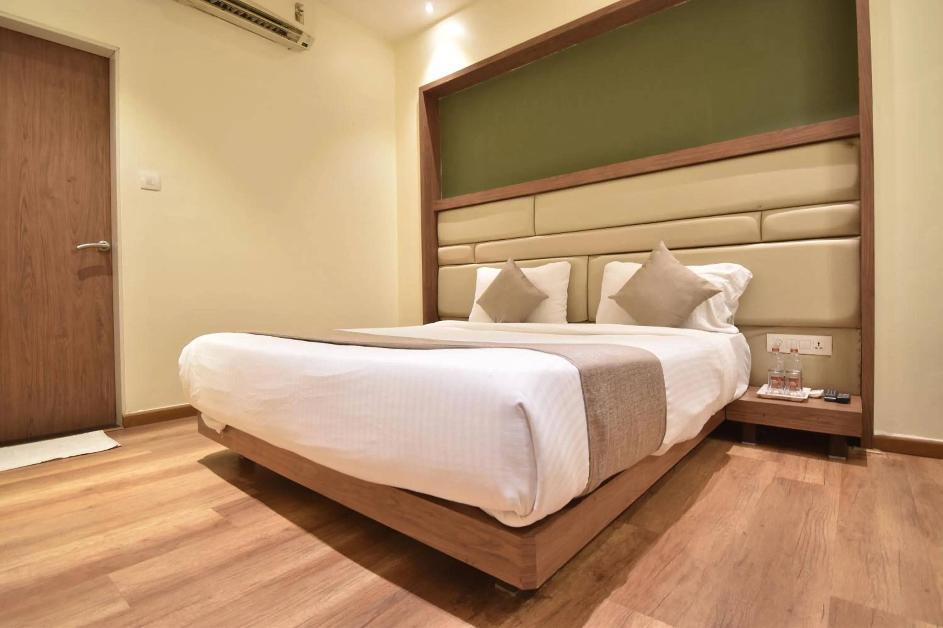 Photo of the whole room, Bed in The Aarya A Smart Business Hotel