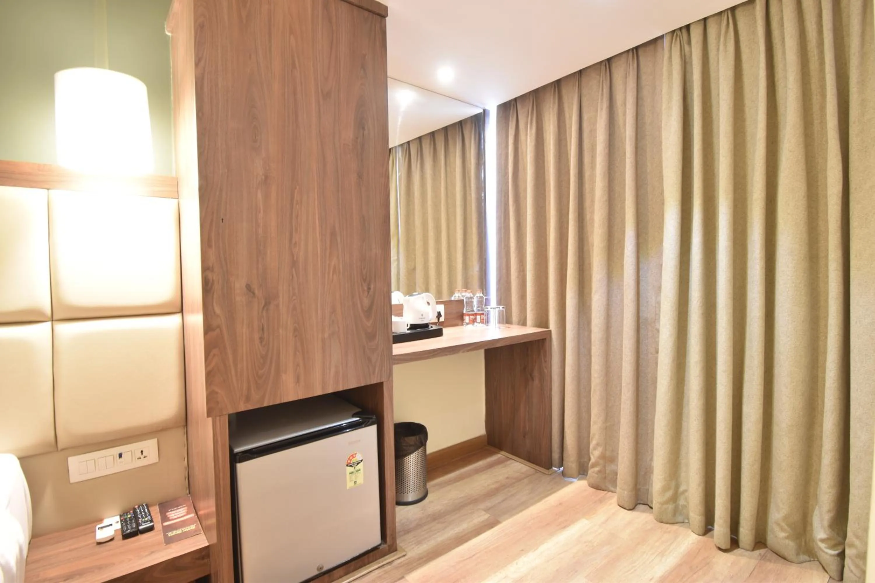 wardrobe in The Aarya A Smart Business Hotel