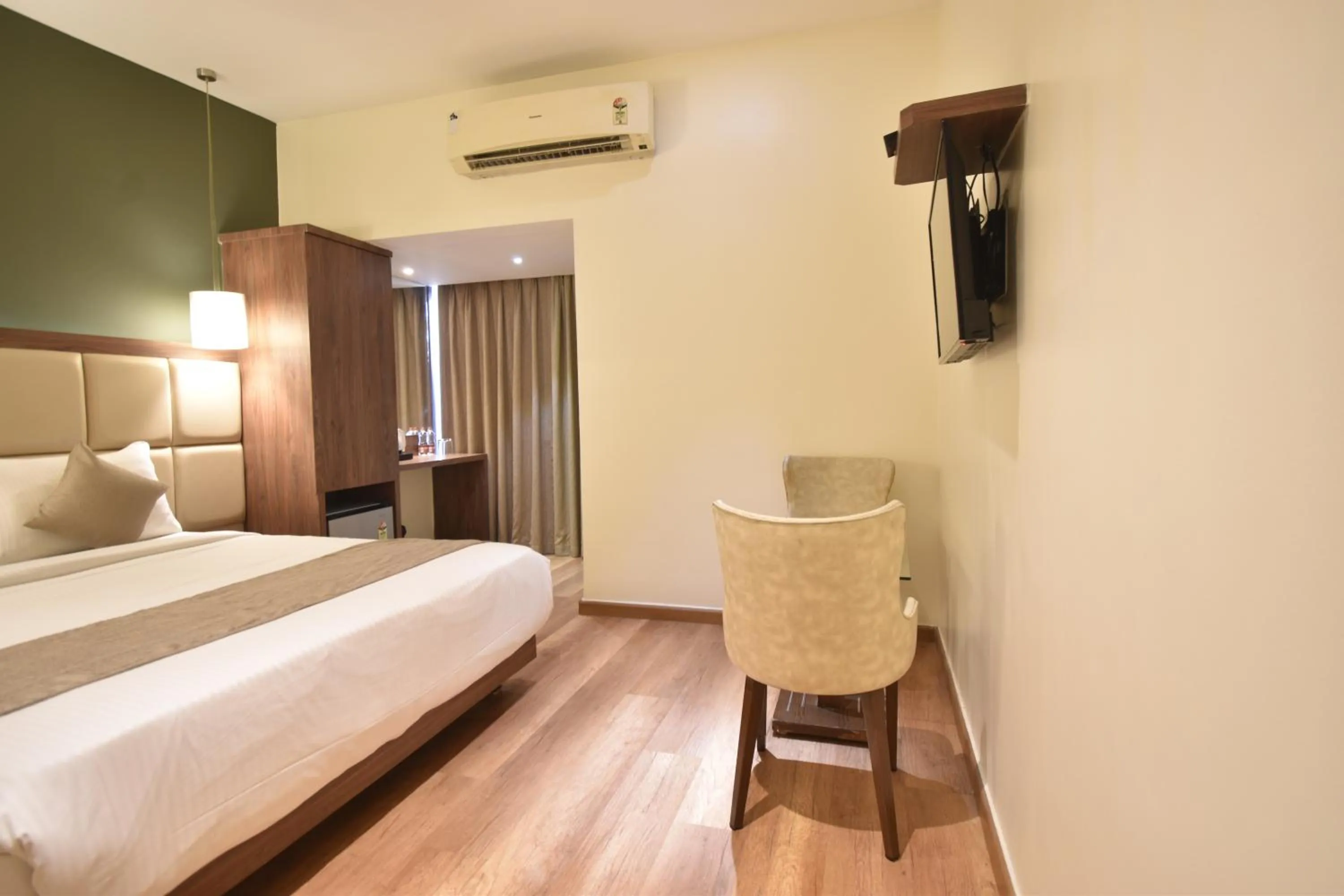 Bedroom, Bed in The Aarya A Smart Business Hotel