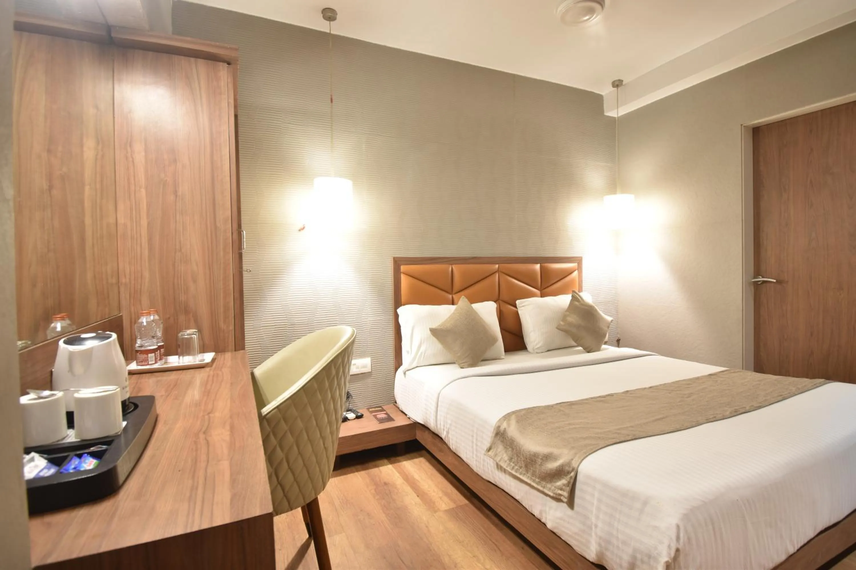 Photo of the whole room, Bed in The Aarya A Smart Business Hotel