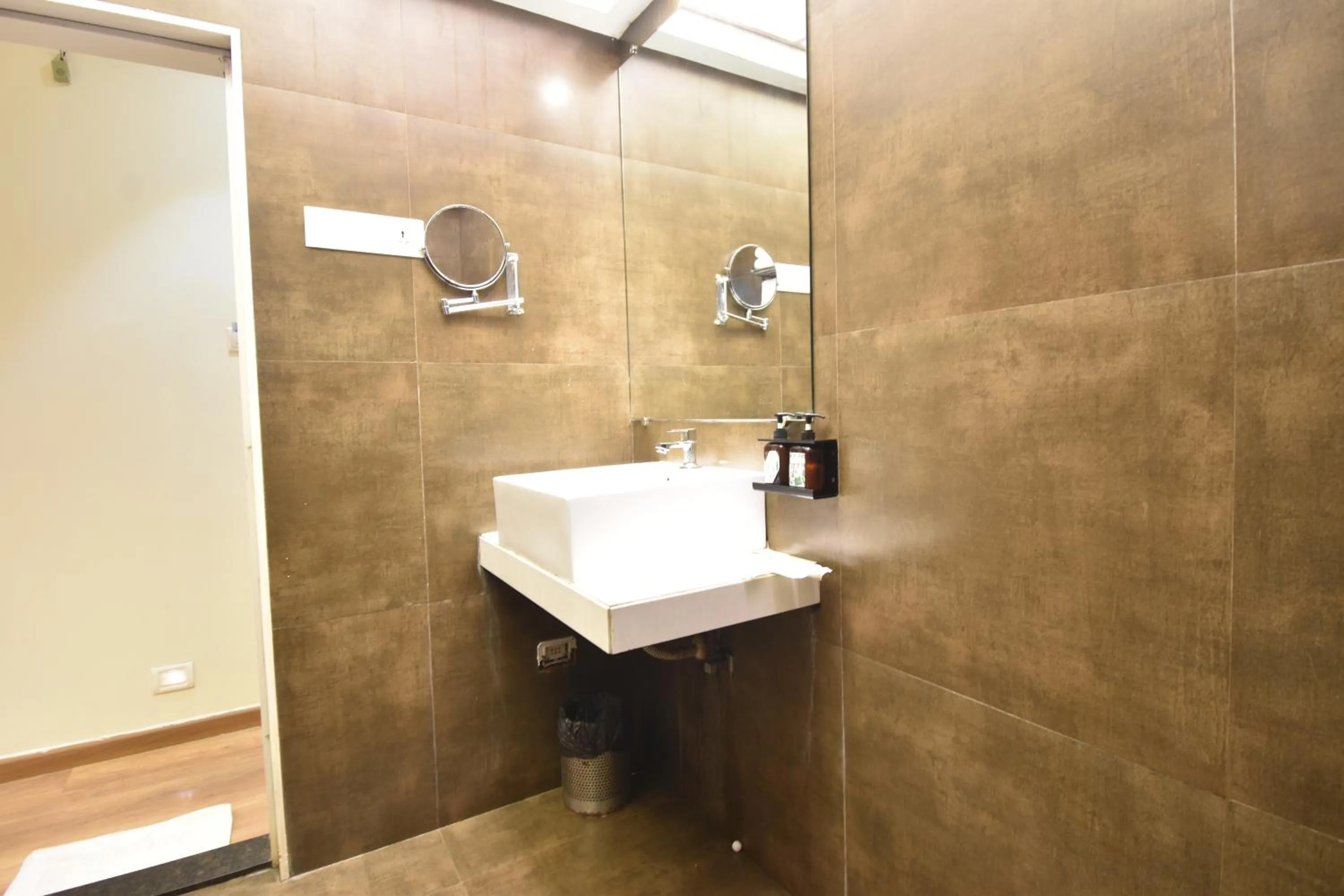 Bathroom in The Aarya A Smart Business Hotel