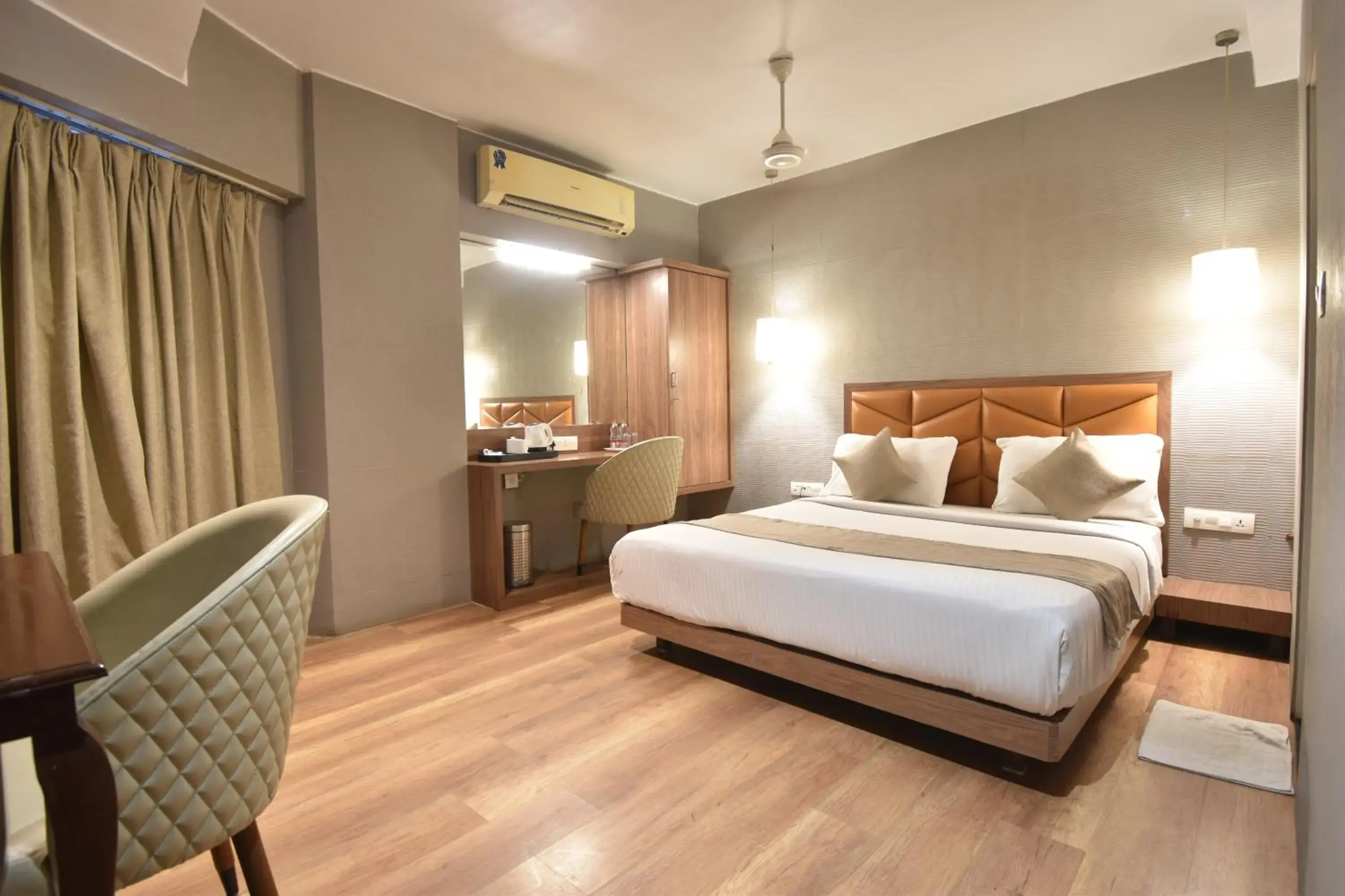 Living room, Bed in The Aarya A Smart Business Hotel Living room, Bed in The Aarya A Smart Business Hotel