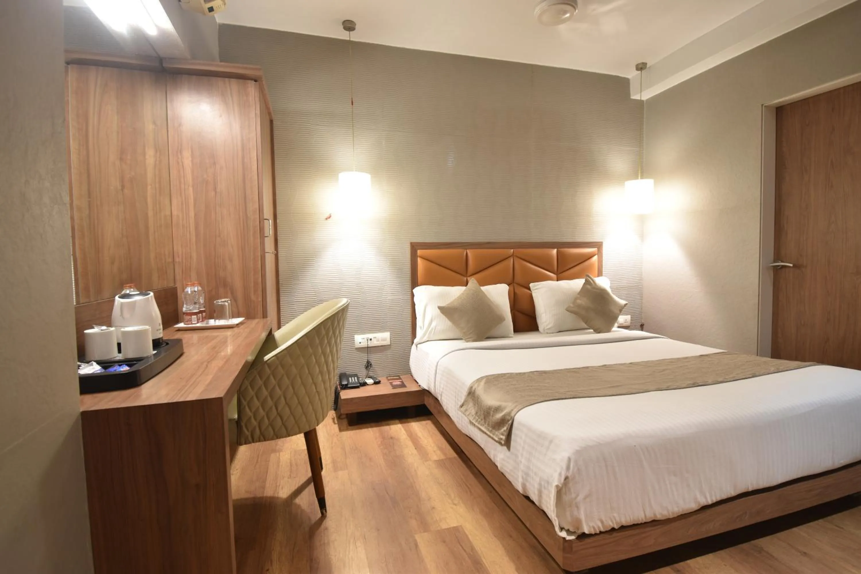 Bedroom, Bed in The Aarya A Smart Business Hotel