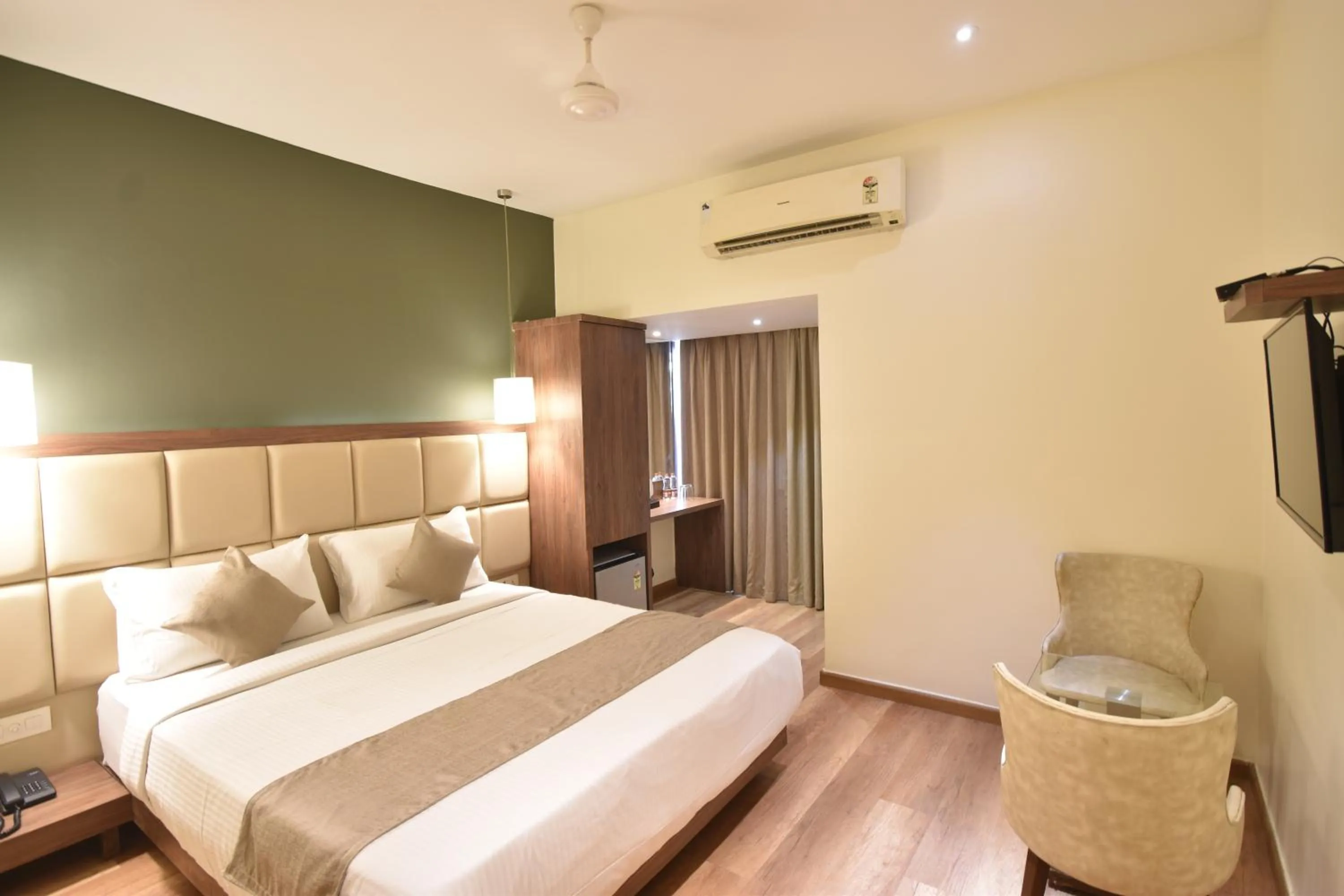Photo of the whole room, Bed in The Aarya A Smart Business Hotel