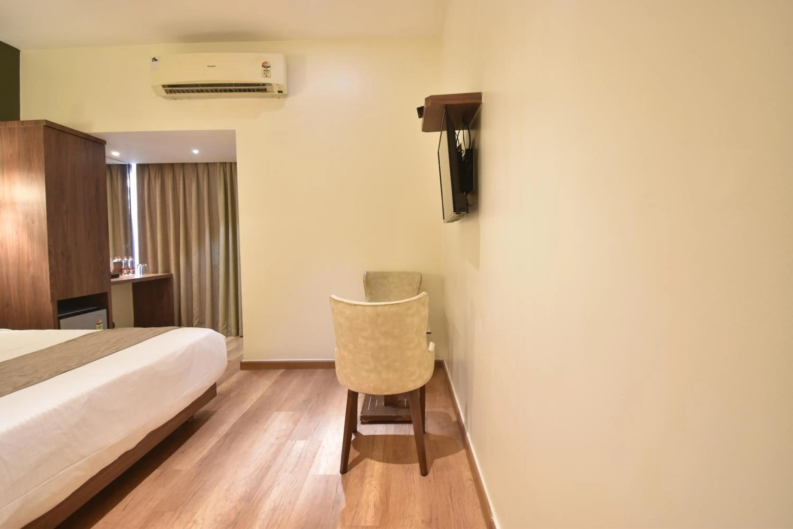 Bedroom, Bed in The Aarya A Smart Business Hotel