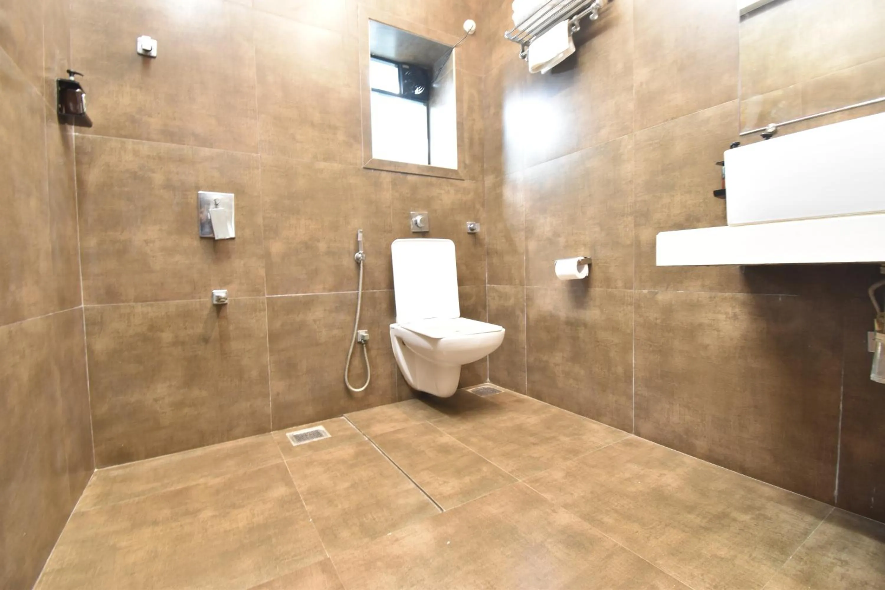 Toilet in The Aarya A Smart Business Hotel