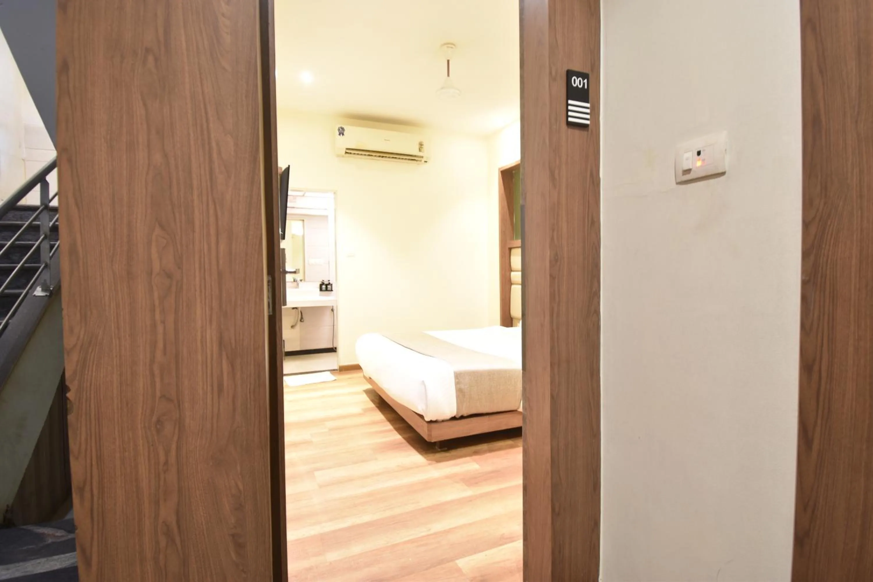 Bedroom, Bed in The Aarya A Smart Business Hotel
