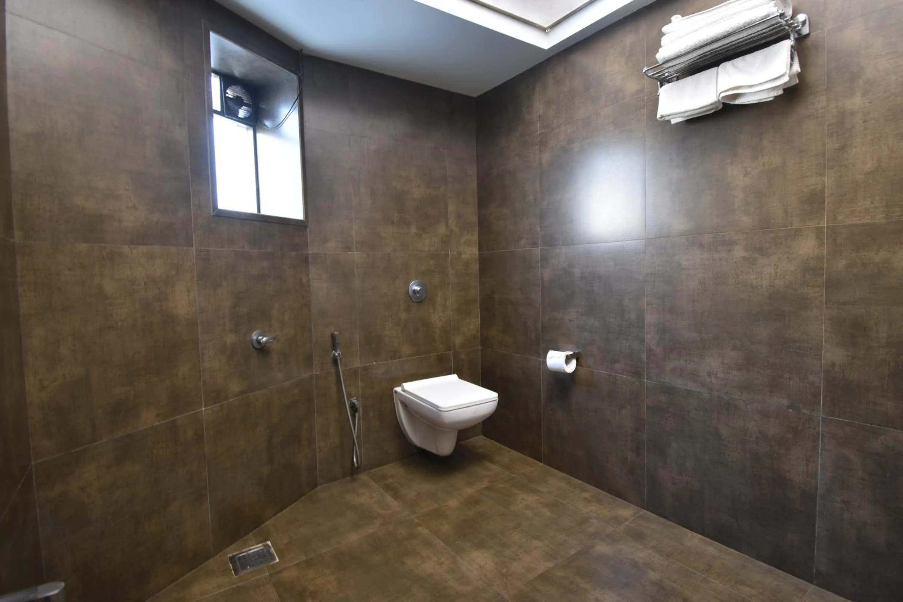 Bathroom in The Aarya A Smart Business Hotel