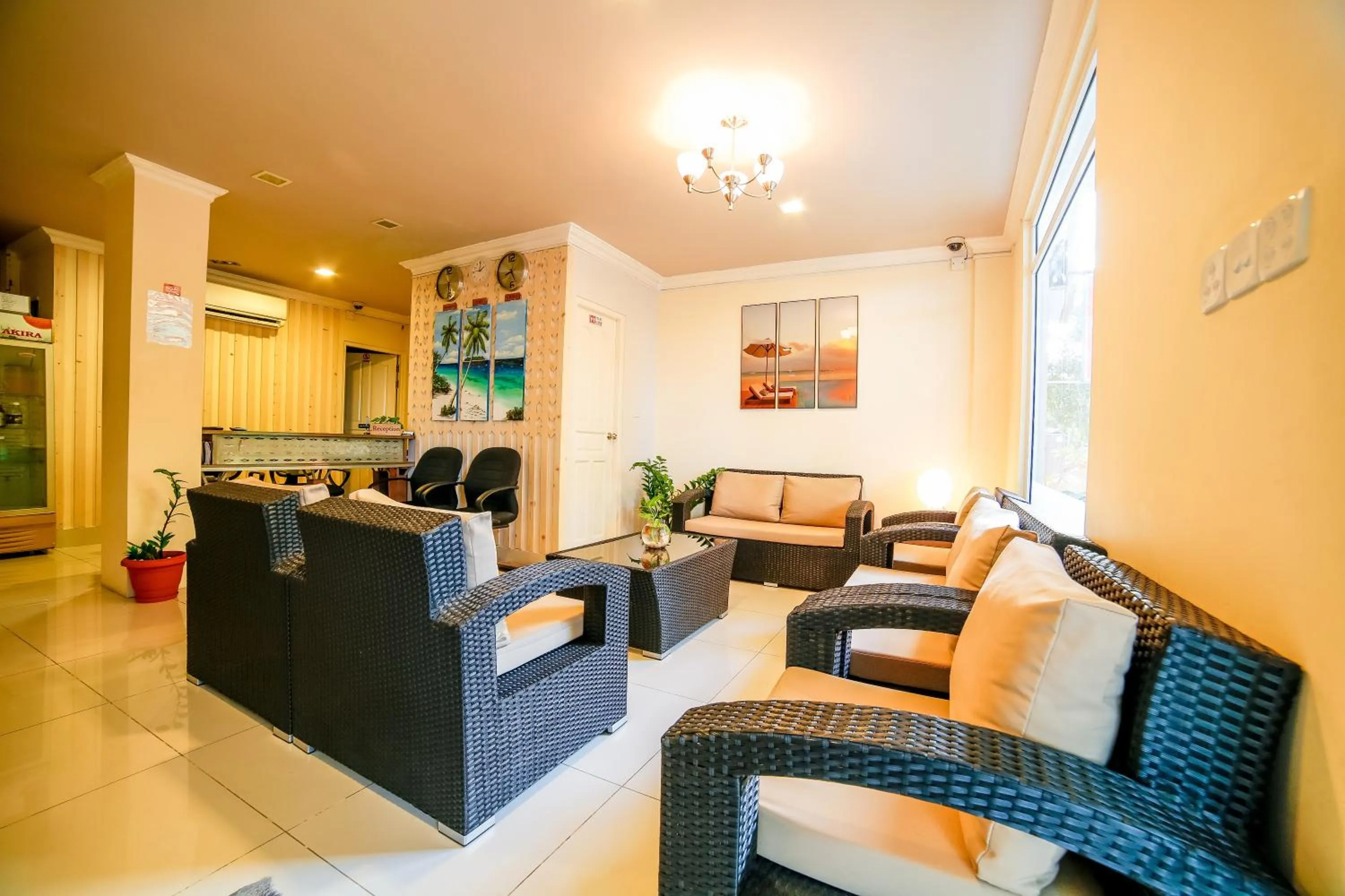 Communal lounge/ TV room in Beach Grand & Spa Premium