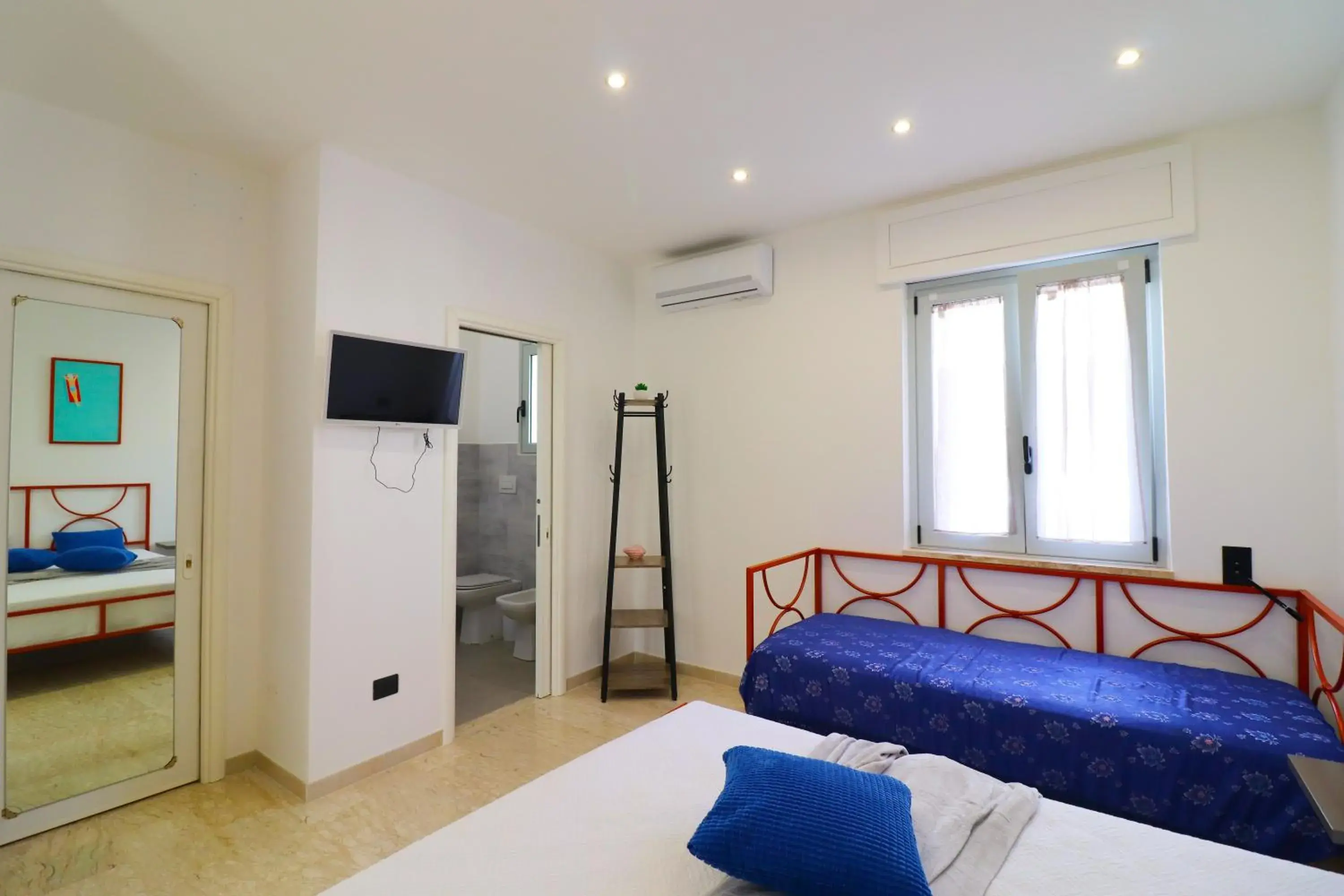 Bed in Casa Malika Space, Comfort Mediterranean Charm in the Heart of Otranto Bed in Casa Malika Space, Comfort Mediterranean Charm in the Heart of Otranto