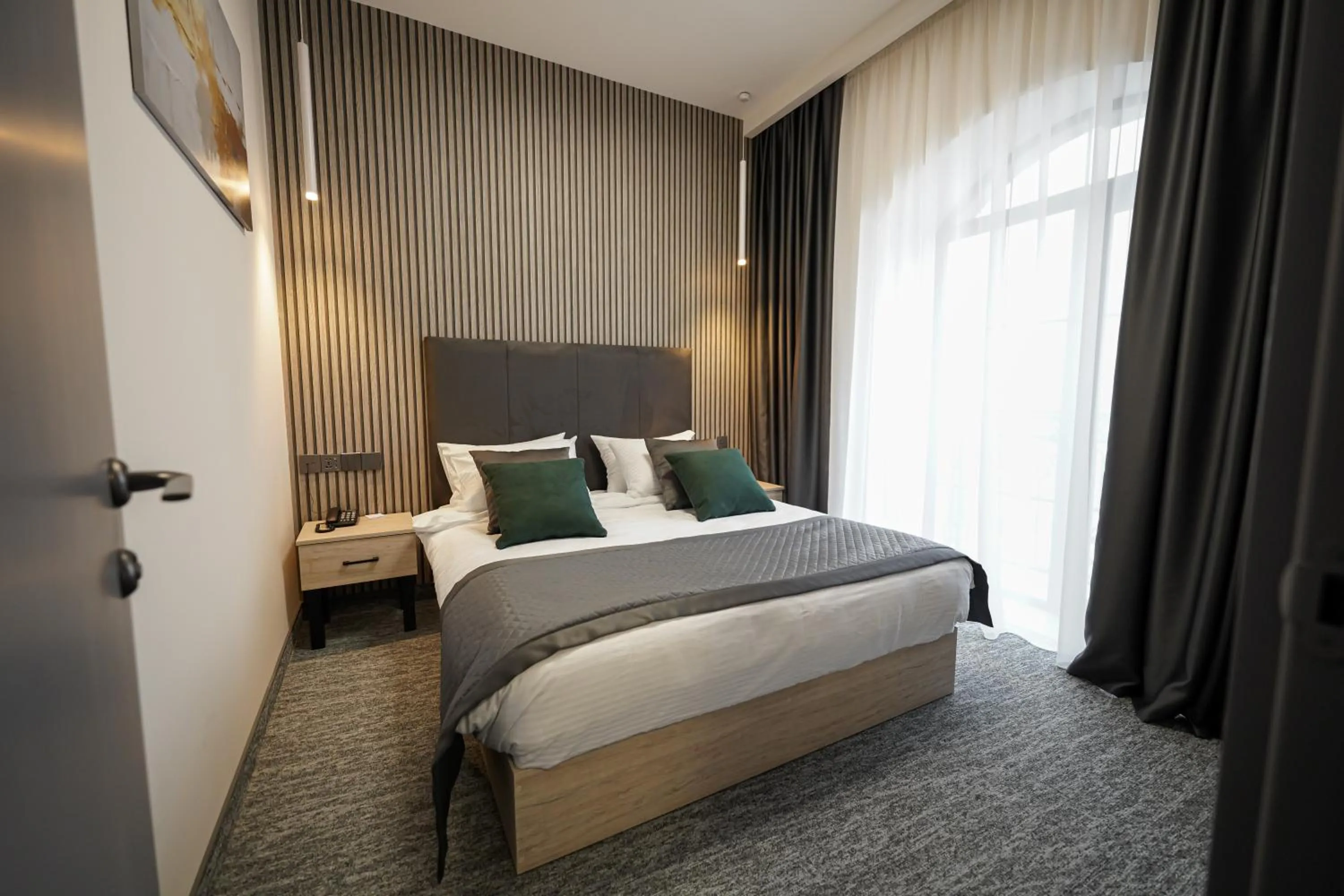 Bed in Dynasty Hotel & SPA