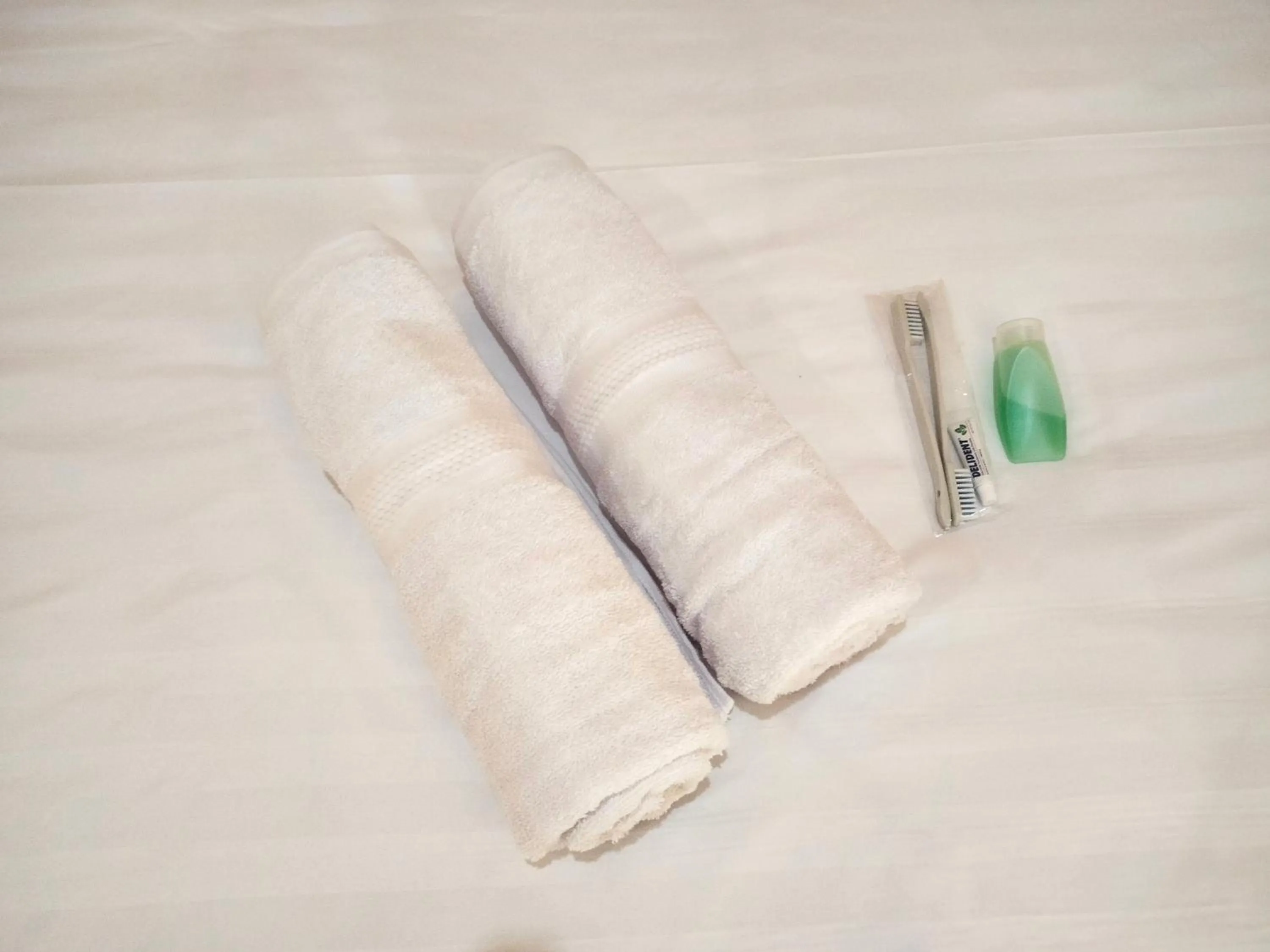 towels, Bed in Wisma Mutiara near Alun Alun Demak Mitra RedDoorz