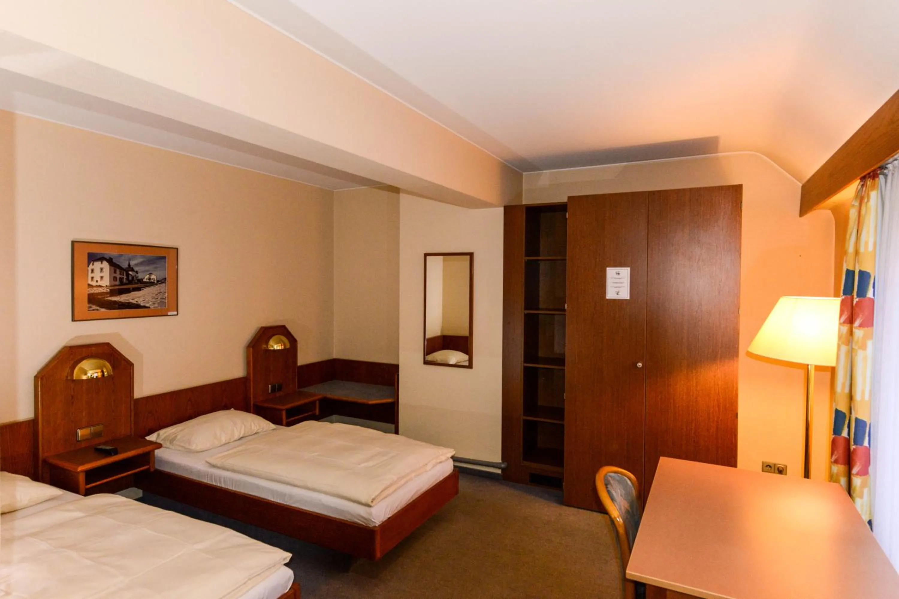 Bed in APPART-HÔTEL MARCO POLO