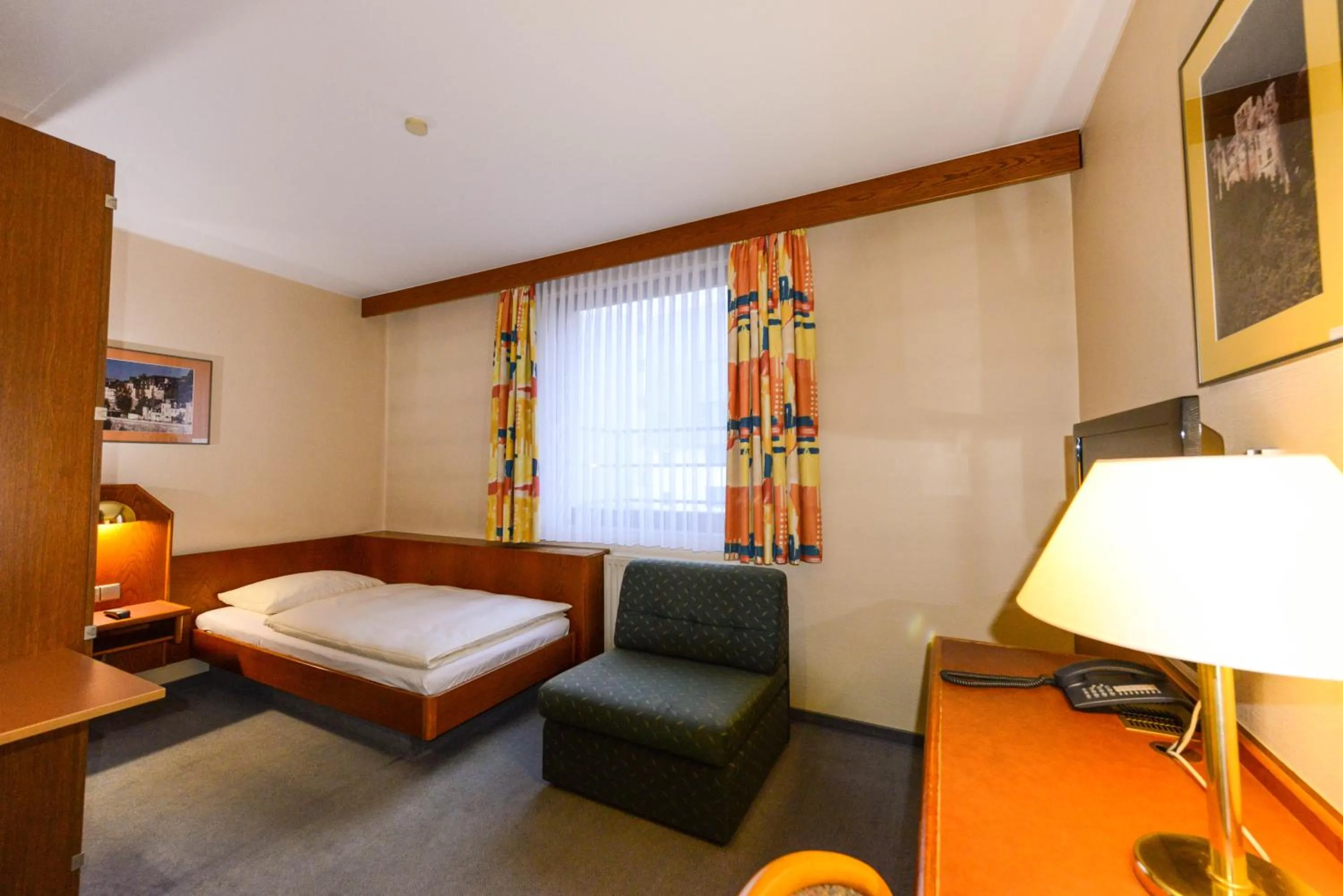 Bed in APPART-HÔTEL MARCO POLO