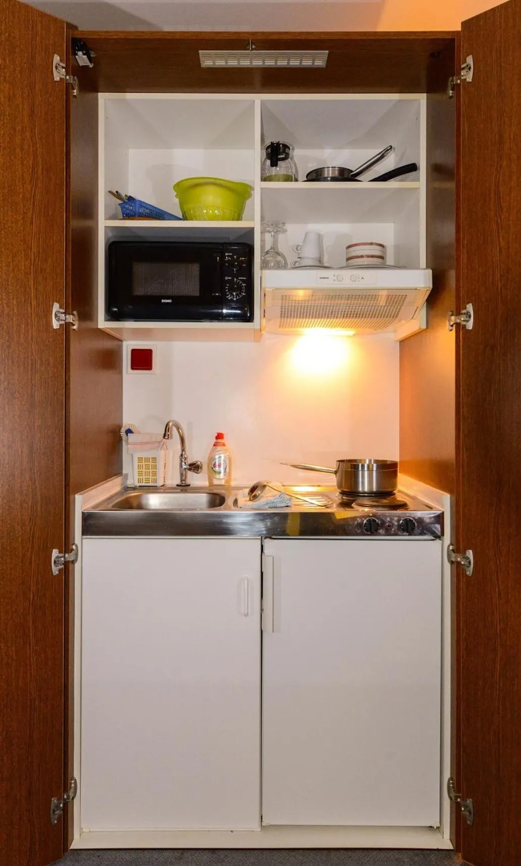 Kitchen or kitchenette in APPART-HÔTEL MARCO POLO