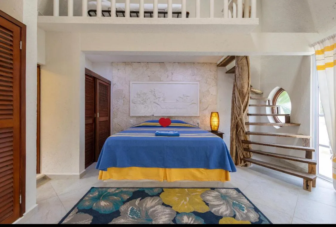 Bed in Casa Cenote Hotel