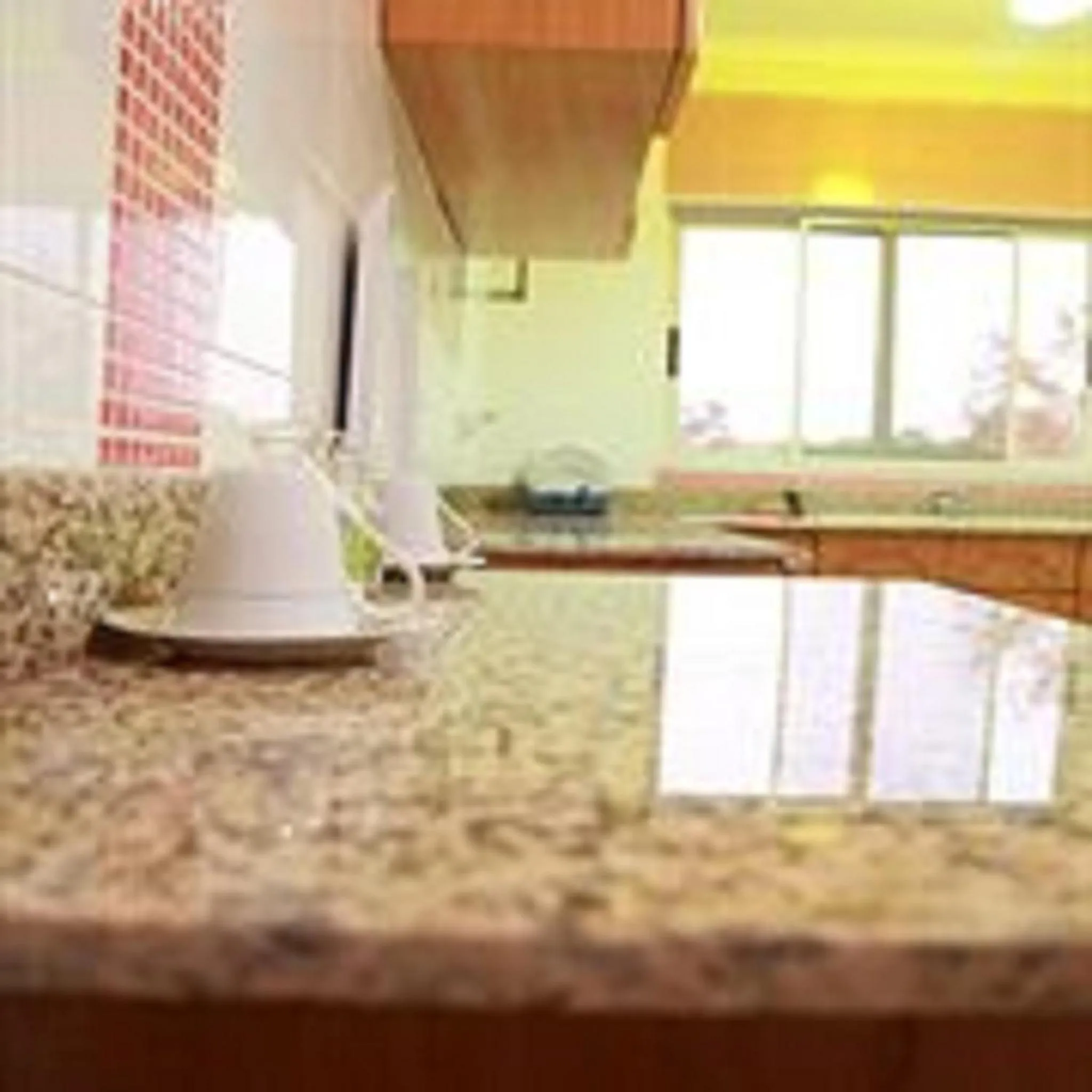 Kitchen or kitchenette in Calabash Green Executive Apartments