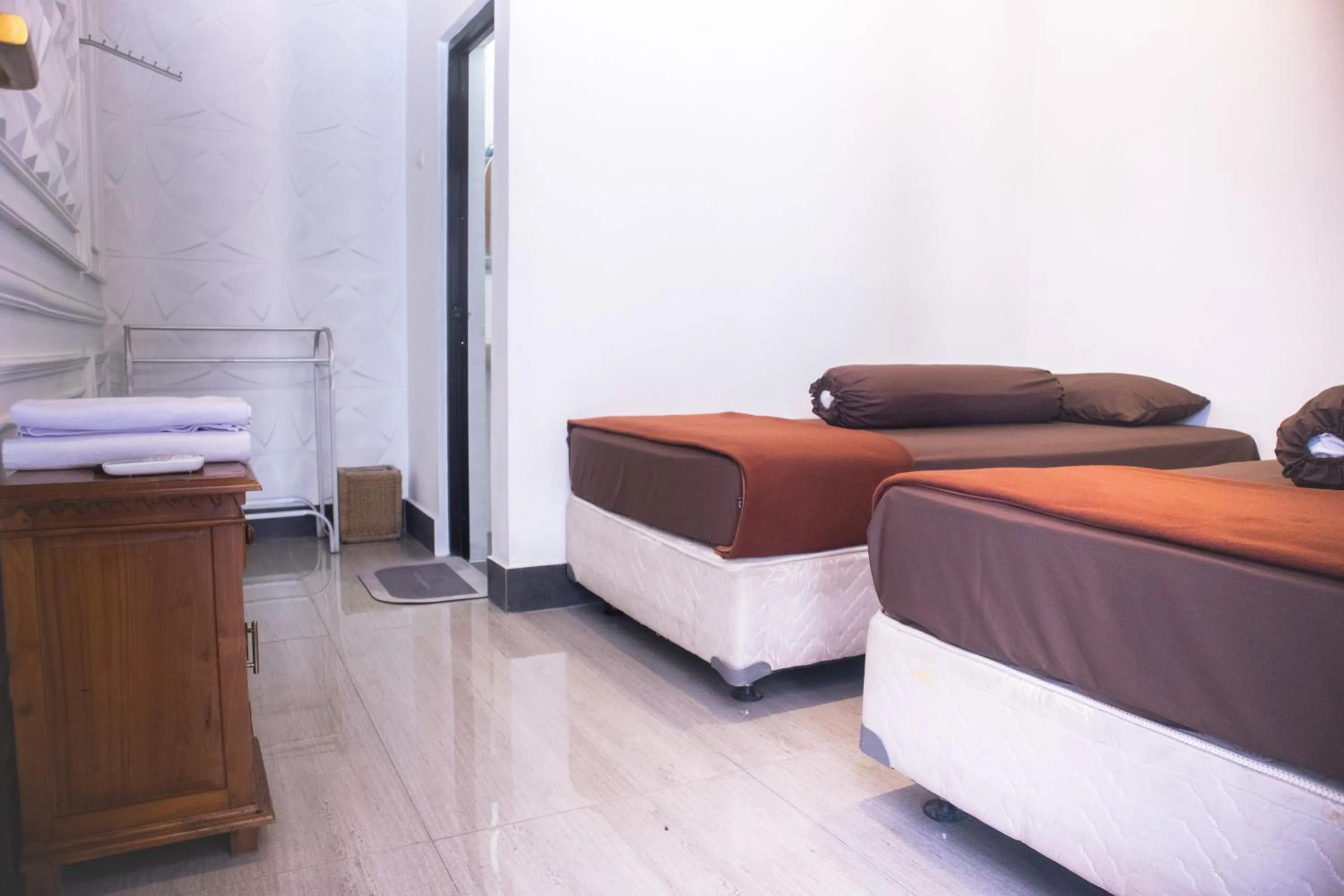 Bed in KAZAIN HOTEL