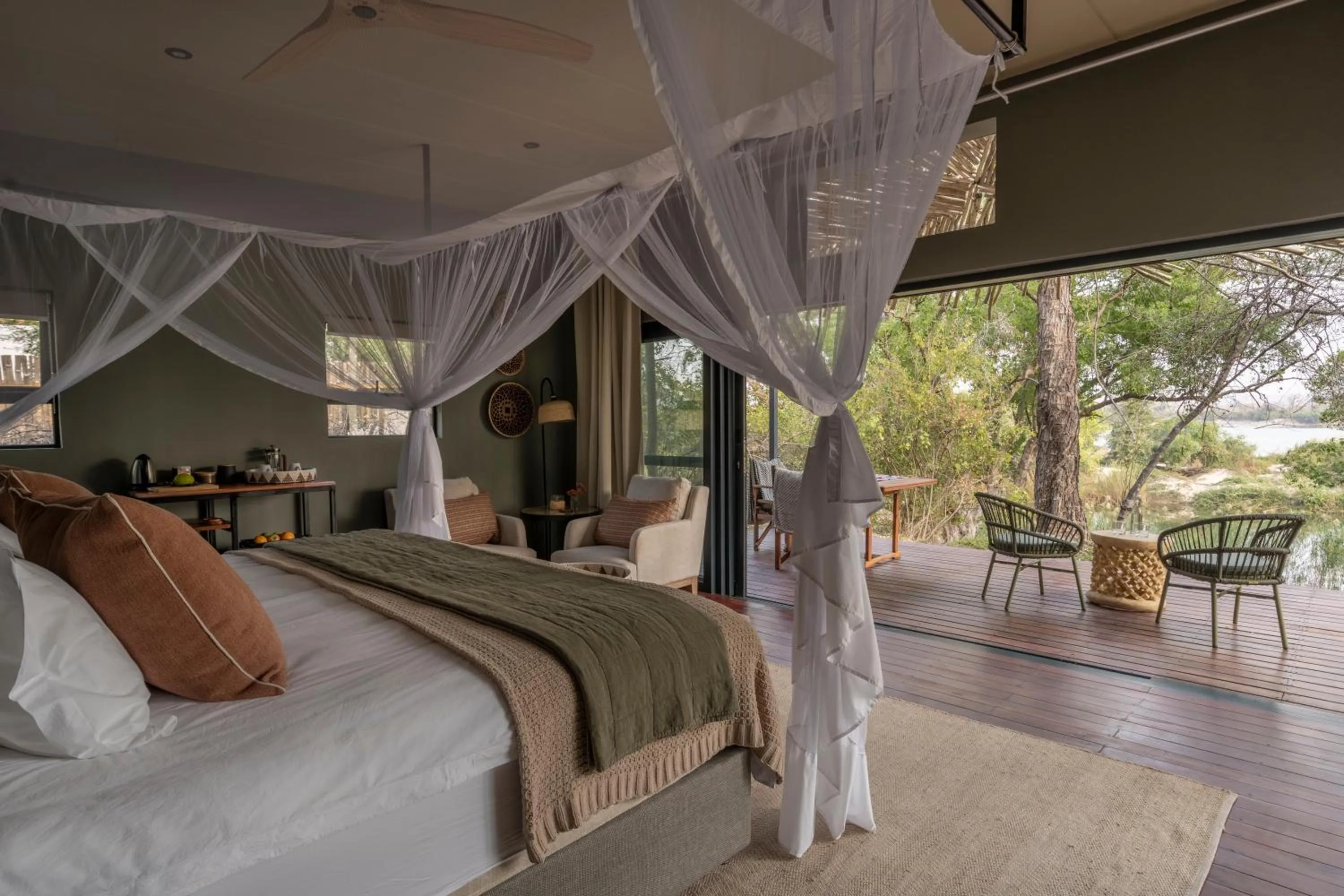 Patio, Bed in Zambezi Dusk River Facing-all inclusive-Luxury Accommodation