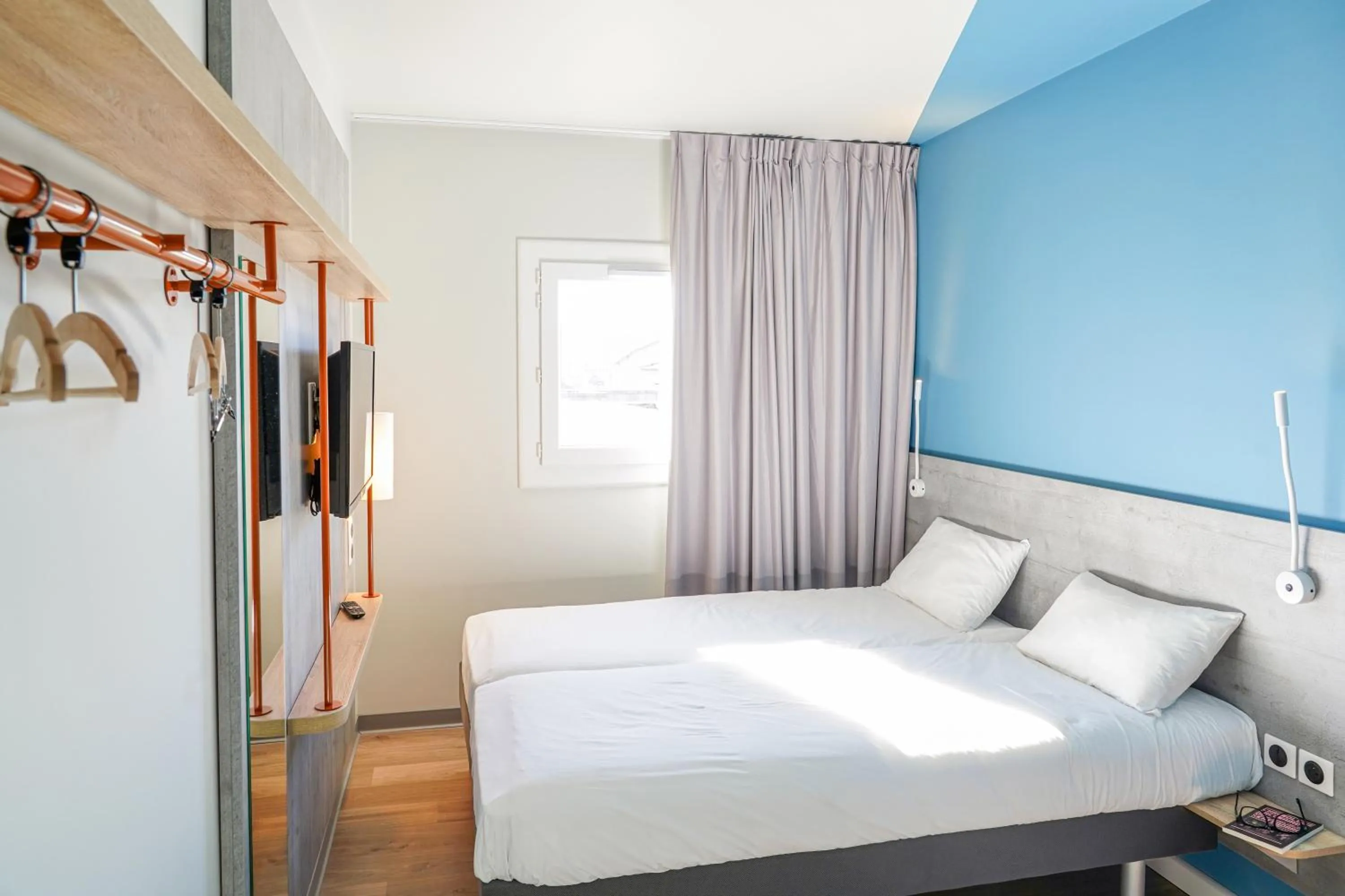 Bed in Ibis Budget Aubenas