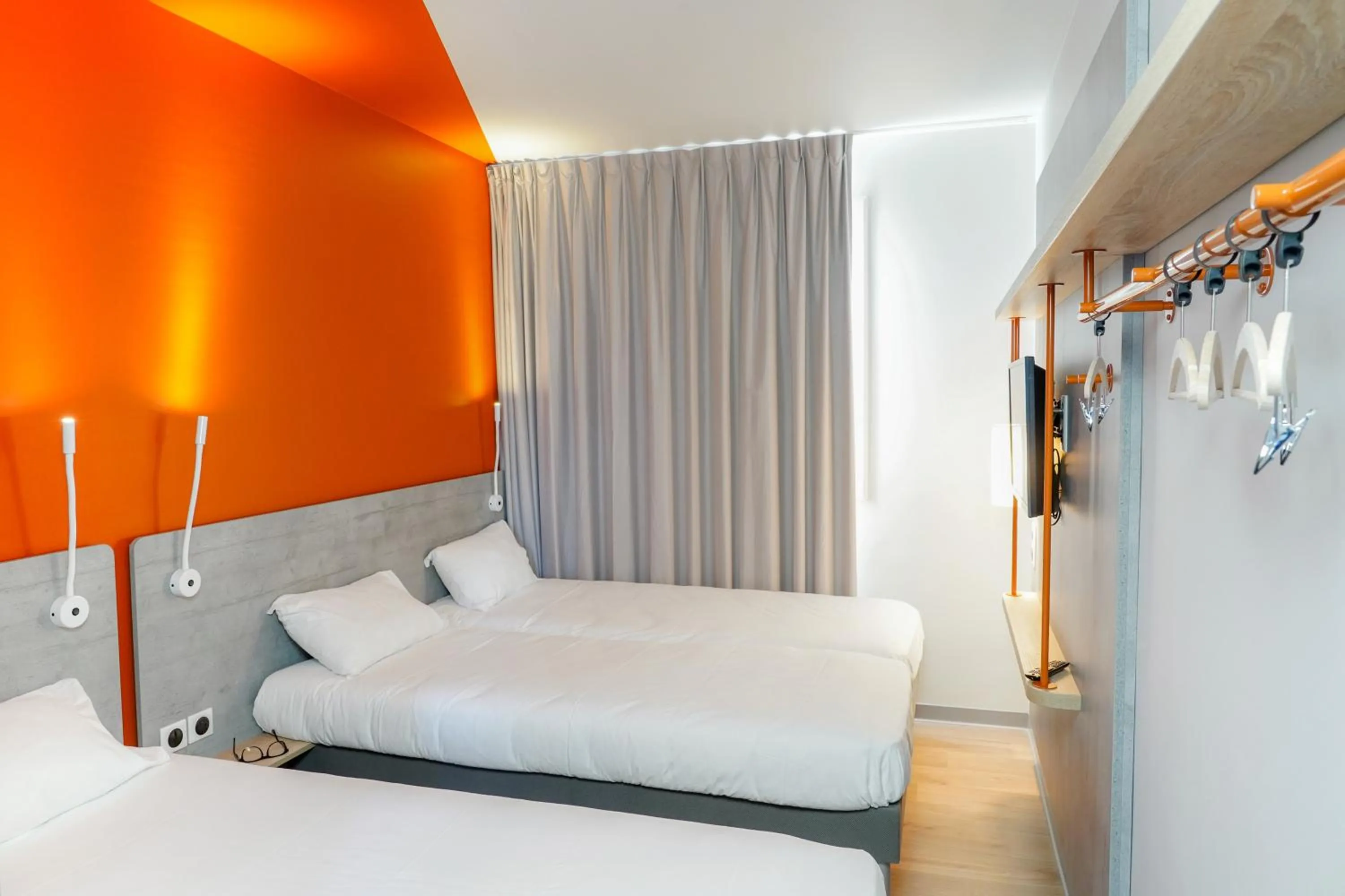 Bed in Ibis Budget Aubenas