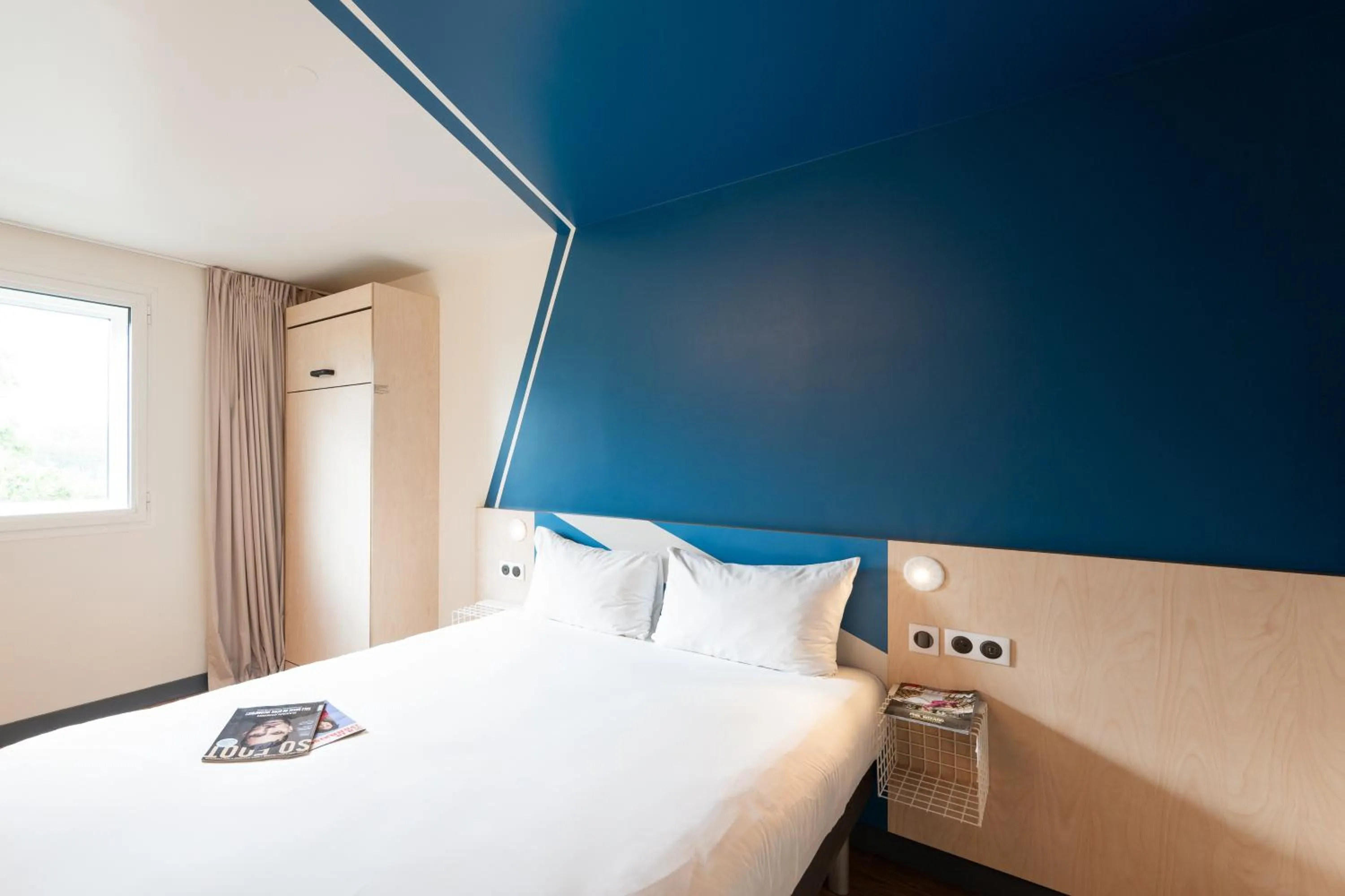 Bed in ibis budget Lyon Centre Confluence