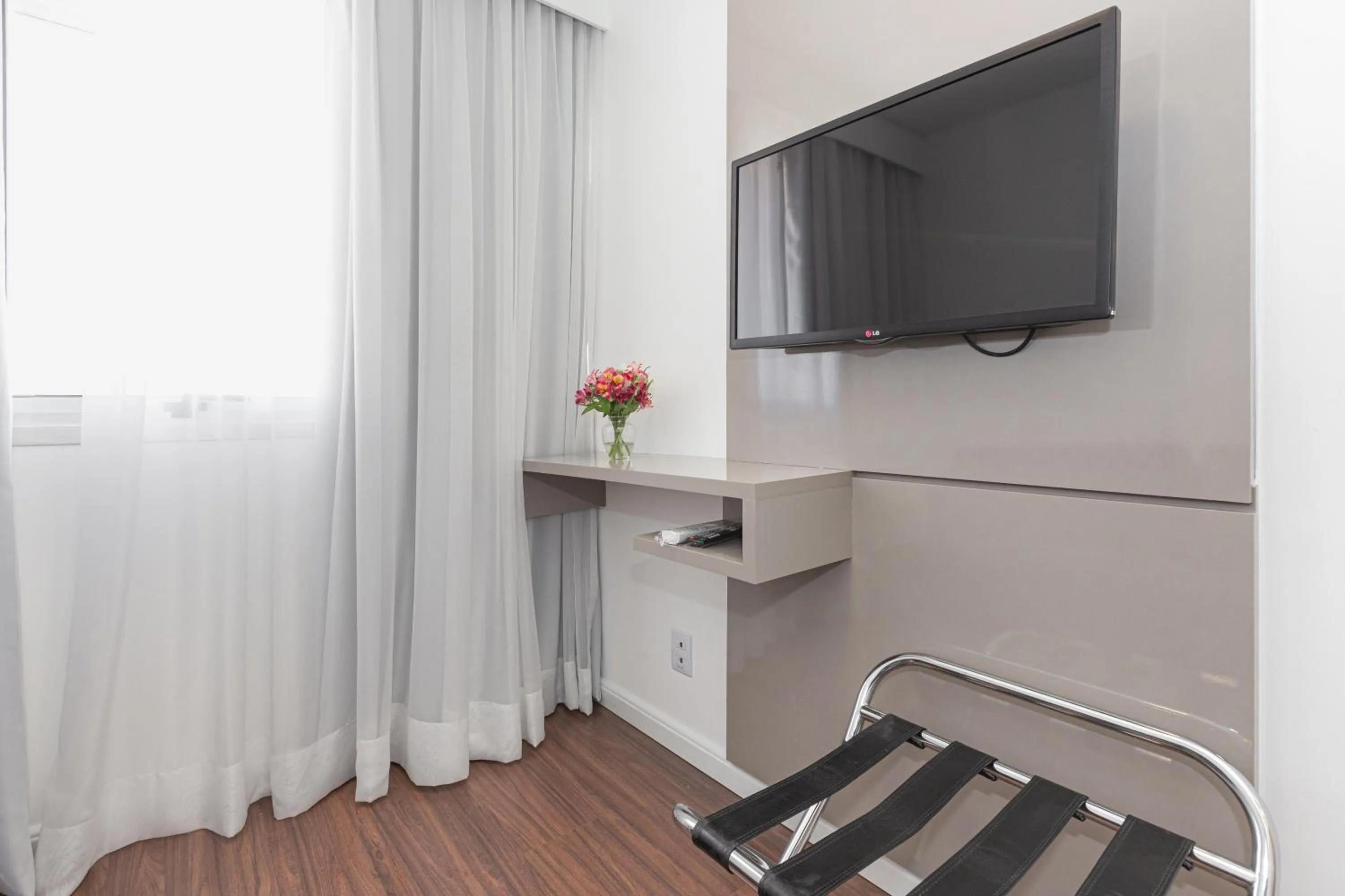 Communal lounge/ TV room in Mercure Sao Paulo Vila Olimpia