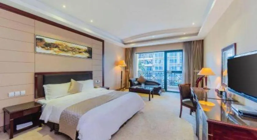 Bed in Dongguan Metropolitan Yijing Hotel