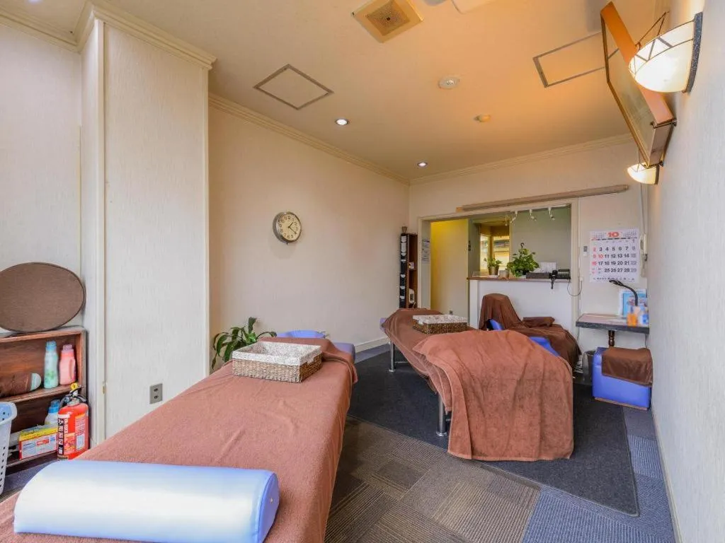 Bed in Itabashi Hotel Hilltop