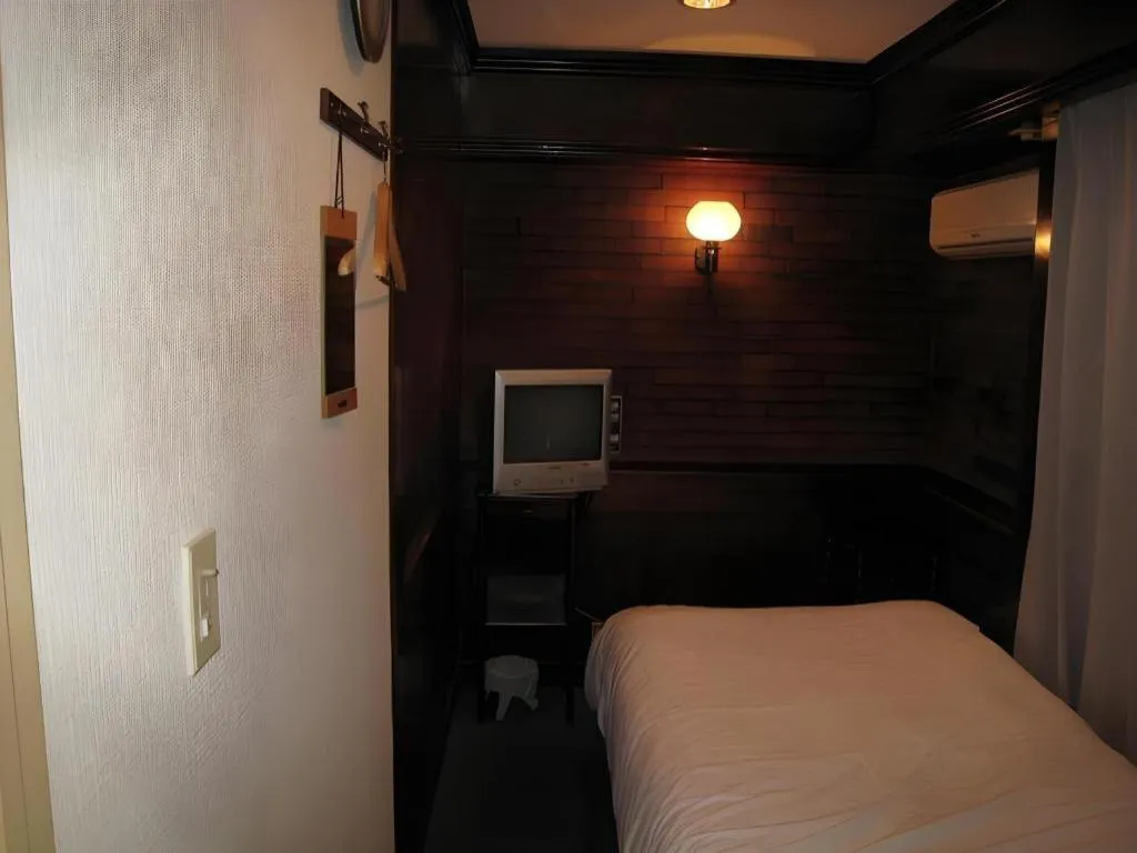 Bed in Itabashi Hotel Hilltop