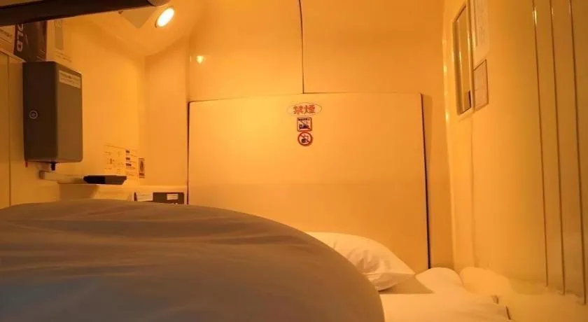 Bed in Itabashi Hotel Hilltop