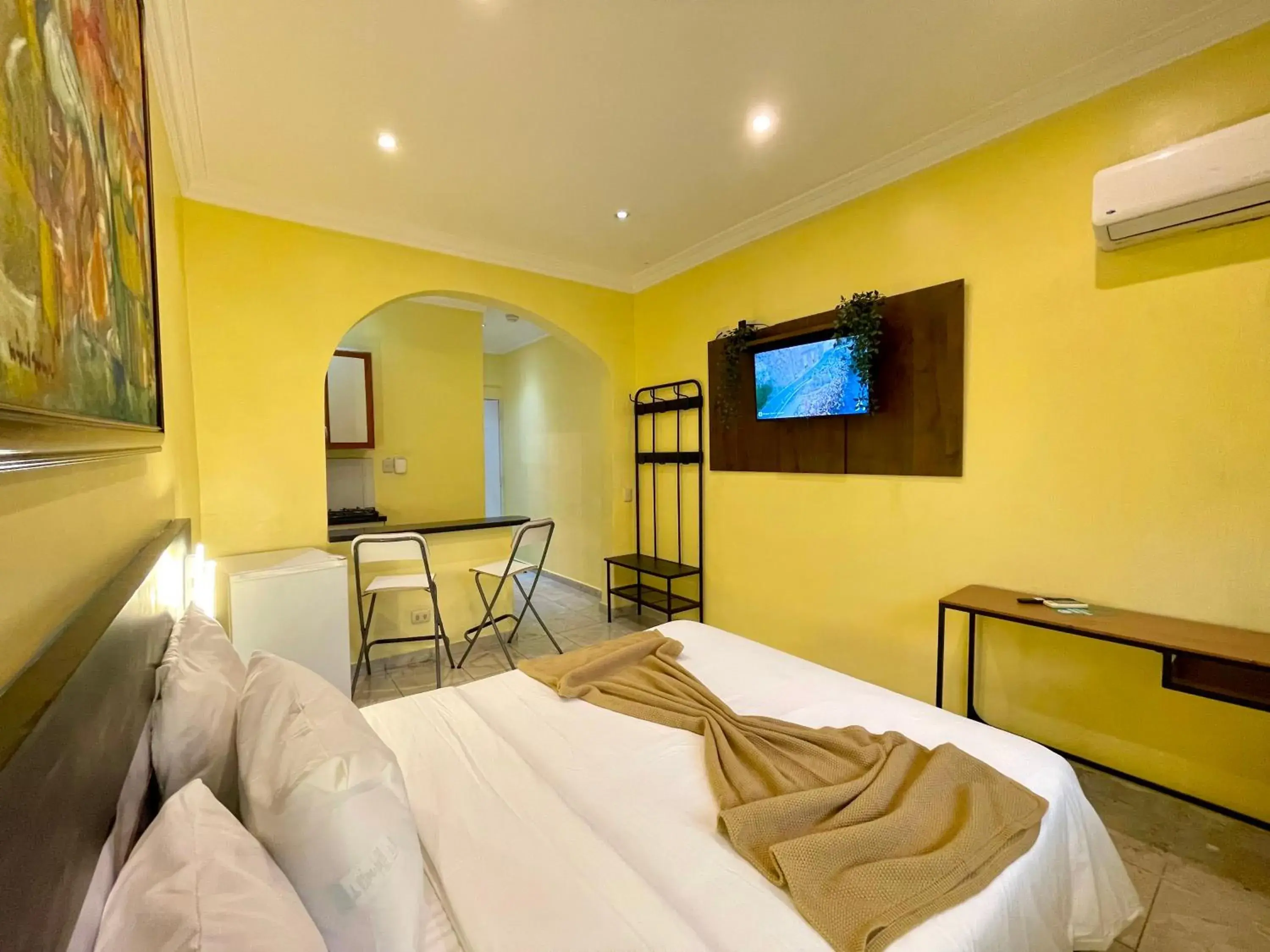 Communal lounge/ TV room, Bed in RIG Puerto Malecón Communal lounge/ TV room, Bed in RIG Puerto Malecón